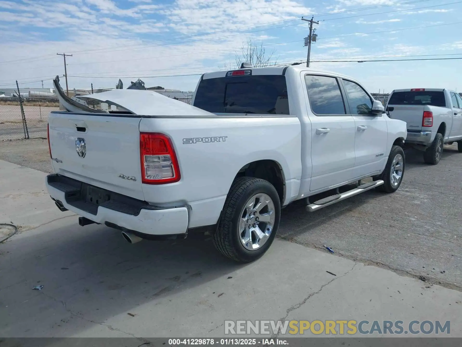 4 Photograph of a damaged car 1C6SRFFT5MN650476 RAM 1500 2021