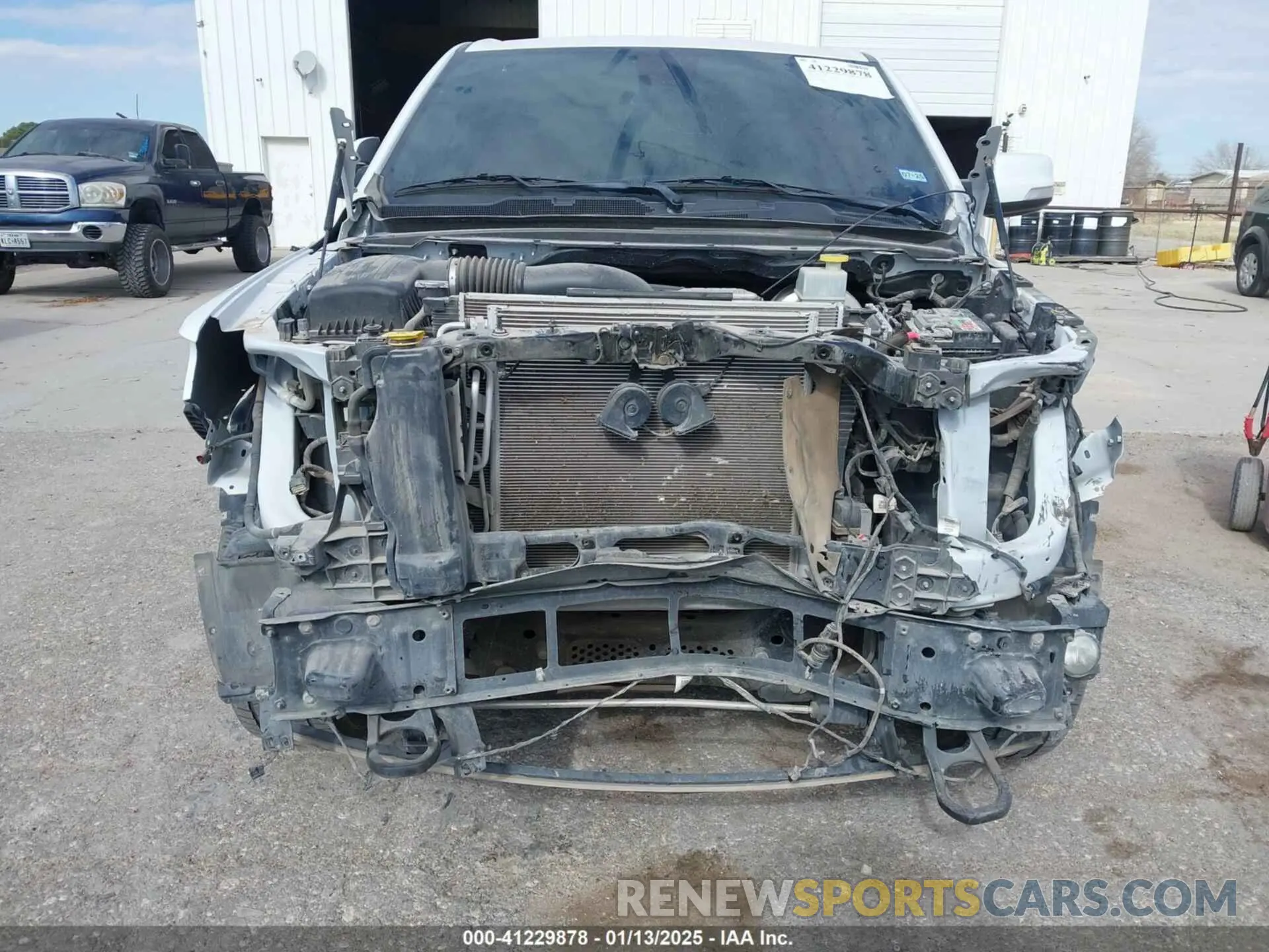 6 Photograph of a damaged car 1C6SRFFT5MN650476 RAM 1500 2021