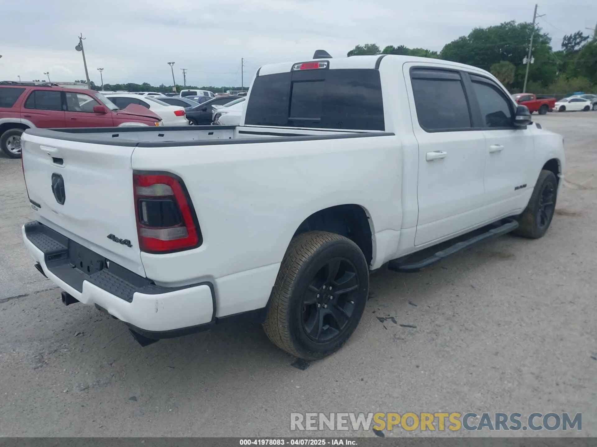 4 Photograph of a damaged car 1C6SRFFT5MN733681 RAM 1500 2021