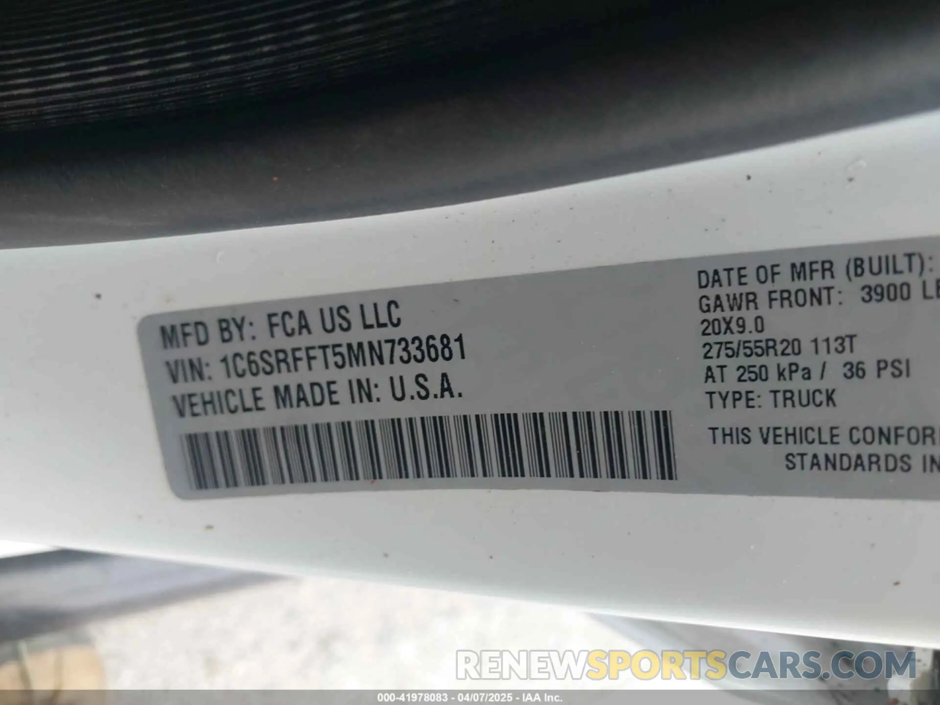 9 Photograph of a damaged car 1C6SRFFT5MN733681 RAM 1500 2021