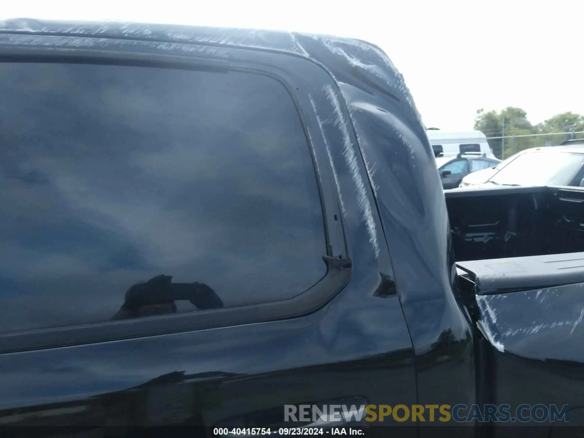 13 Photograph of a damaged car 1C6SRFFT5MN778054 RAM 1500 2021