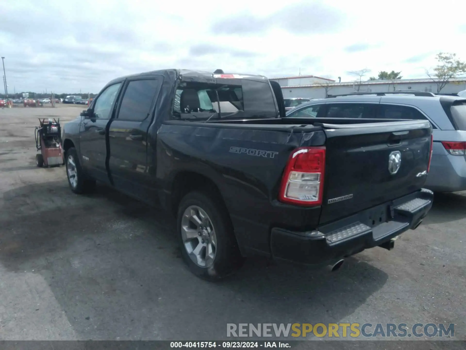 3 Photograph of a damaged car 1C6SRFFT5MN778054 RAM 1500 2021
