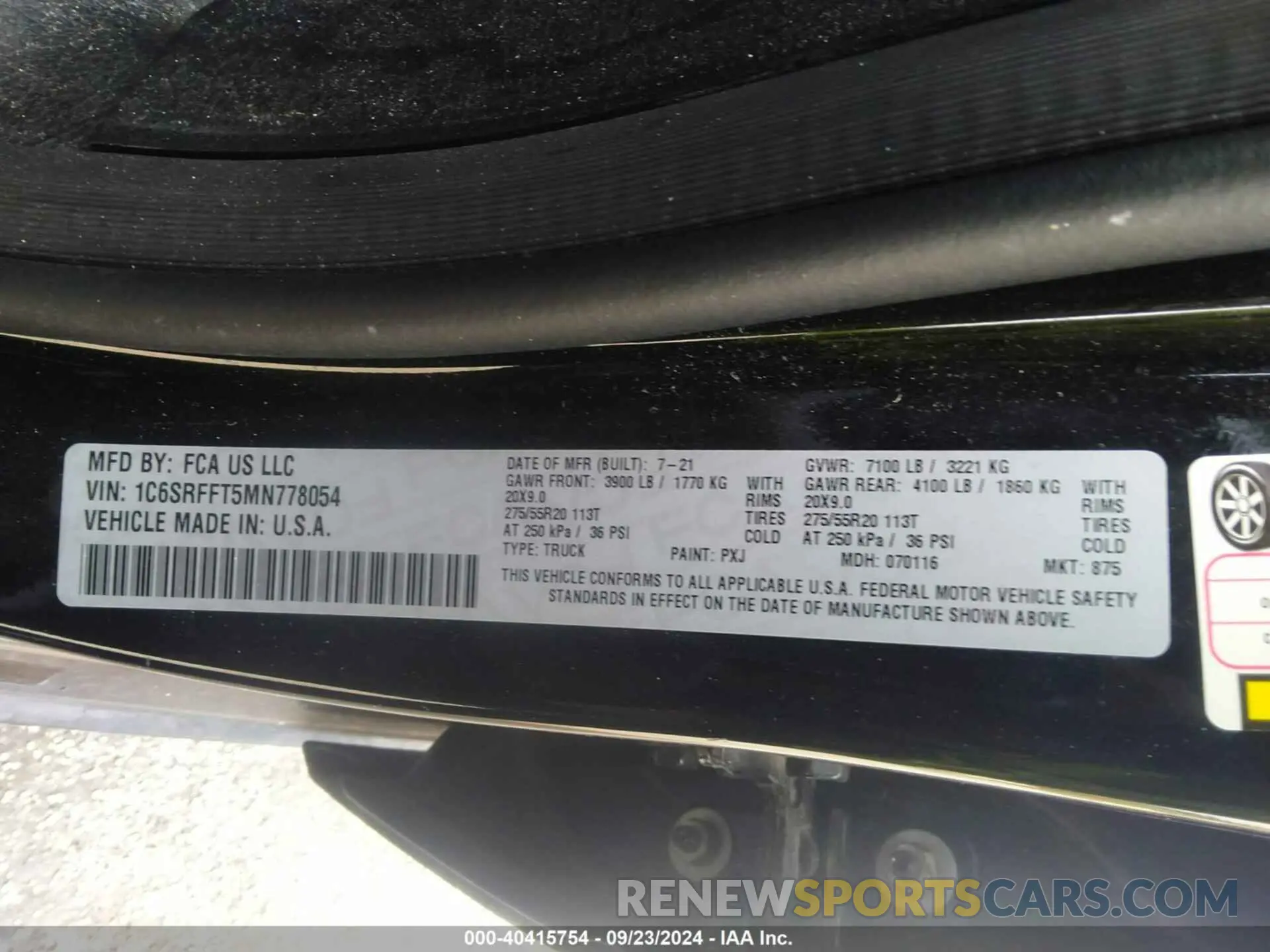 9 Photograph of a damaged car 1C6SRFFT5MN778054 RAM 1500 2021