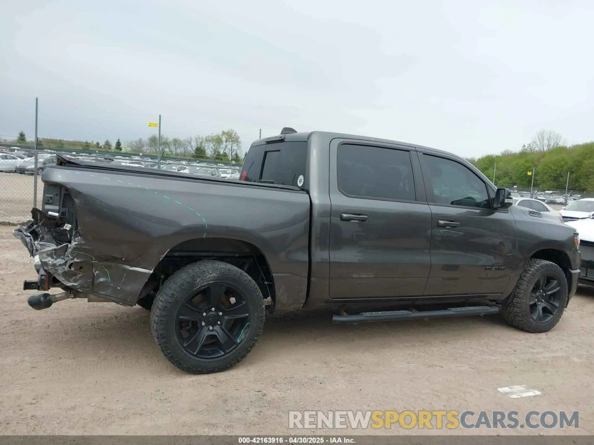 13 Photograph of a damaged car 1C6SRFFT6MN649823 RAM 1500 2021