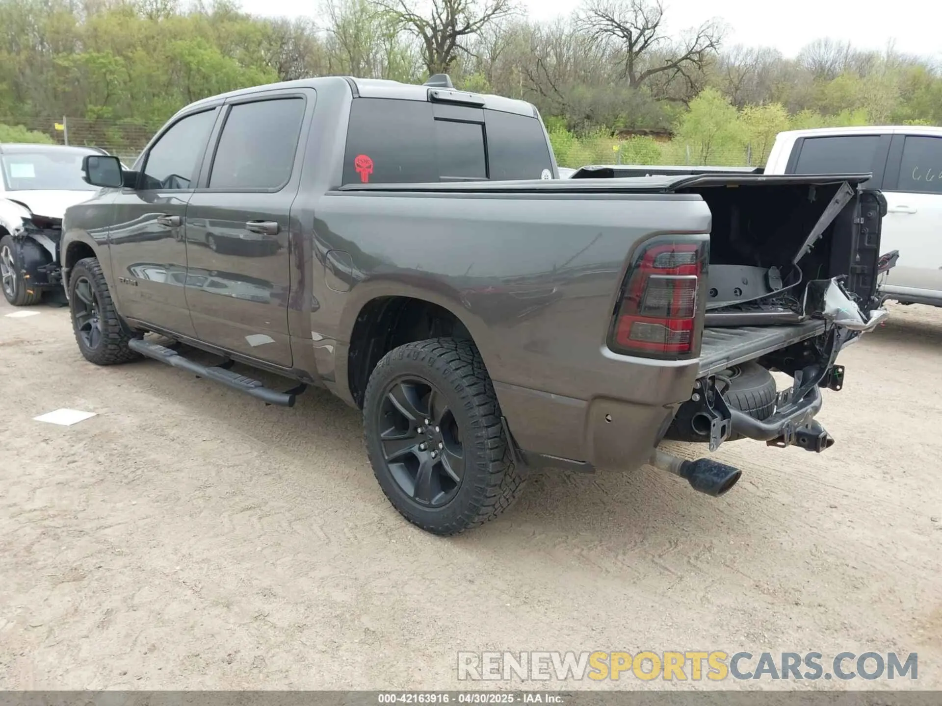 3 Photograph of a damaged car 1C6SRFFT6MN649823 RAM 1500 2021
