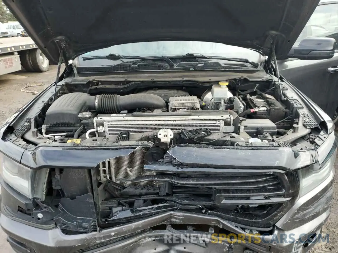 11 Photograph of a damaged car 1C6SRFFT6MN683034 RAM 1500 2021