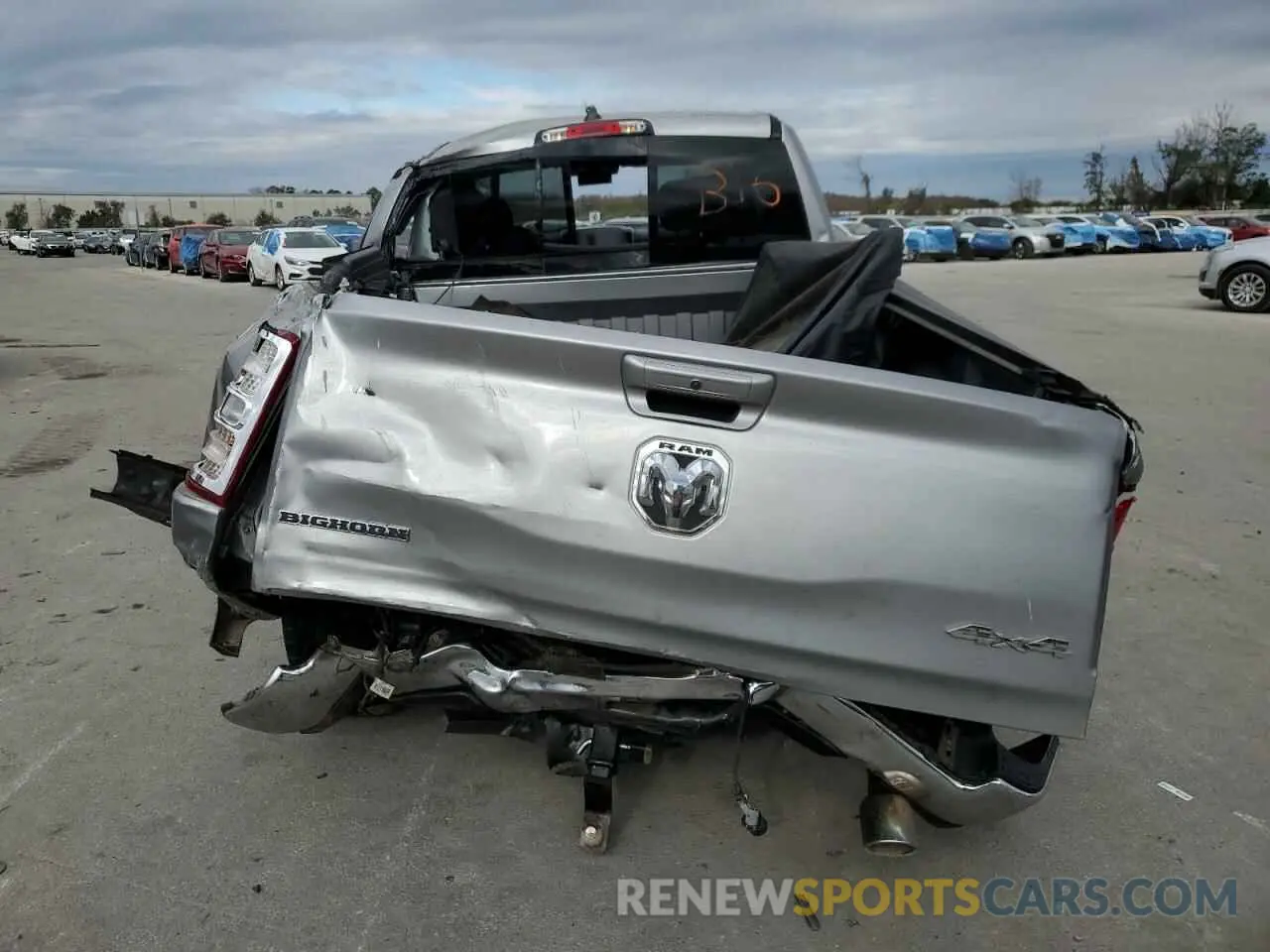 6 Photograph of a damaged car 1C6SRFFT6MN770187 RAM 1500 2021