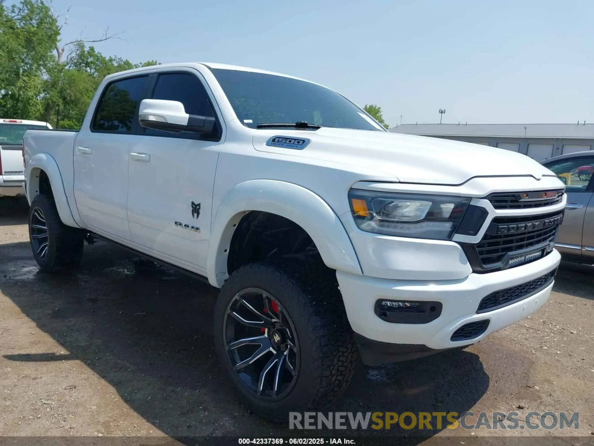 1 Photograph of a damaged car 1C6SRFFT6MN785594 RAM 1500 2021