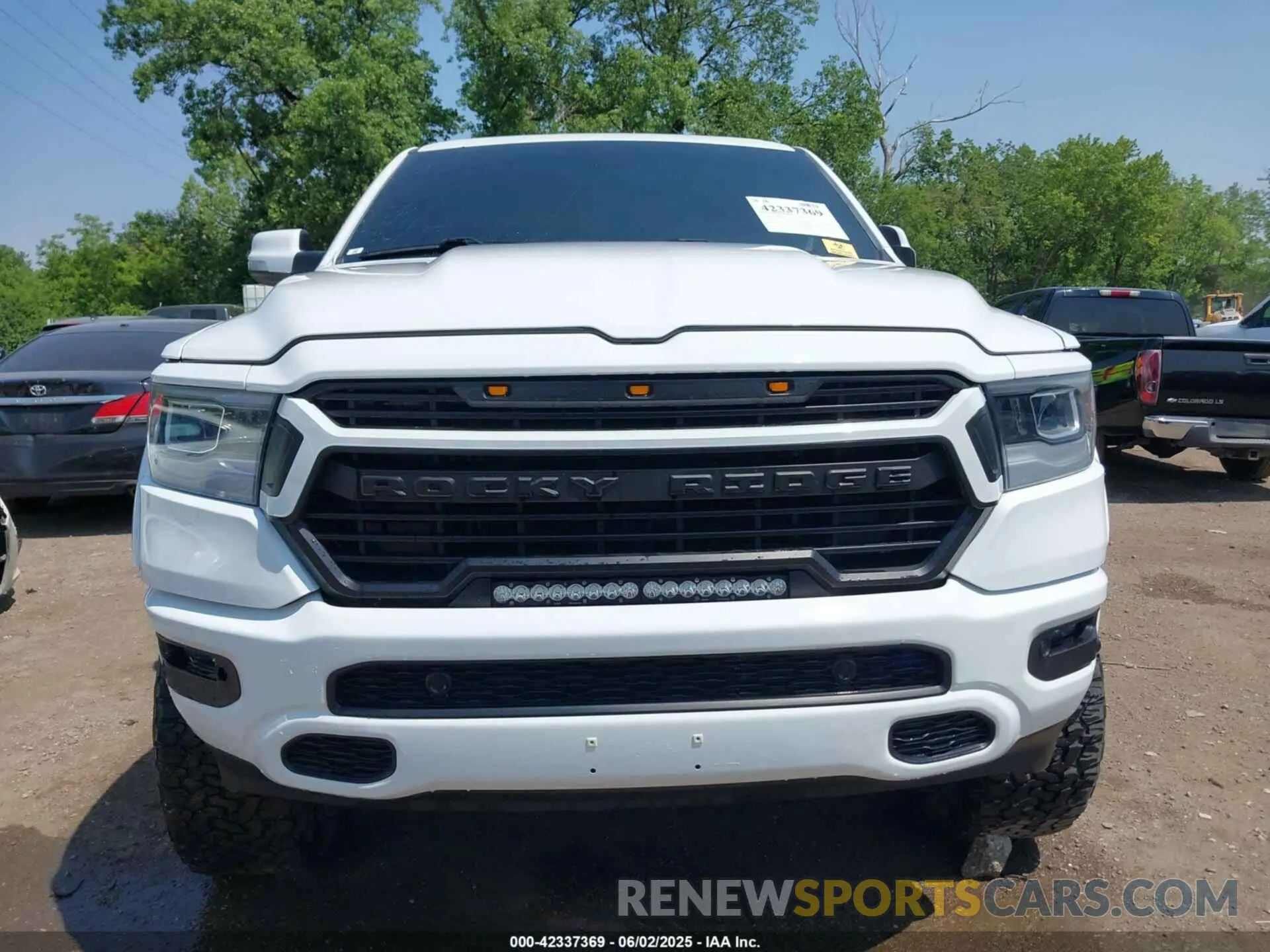 11 Photograph of a damaged car 1C6SRFFT6MN785594 RAM 1500 2021