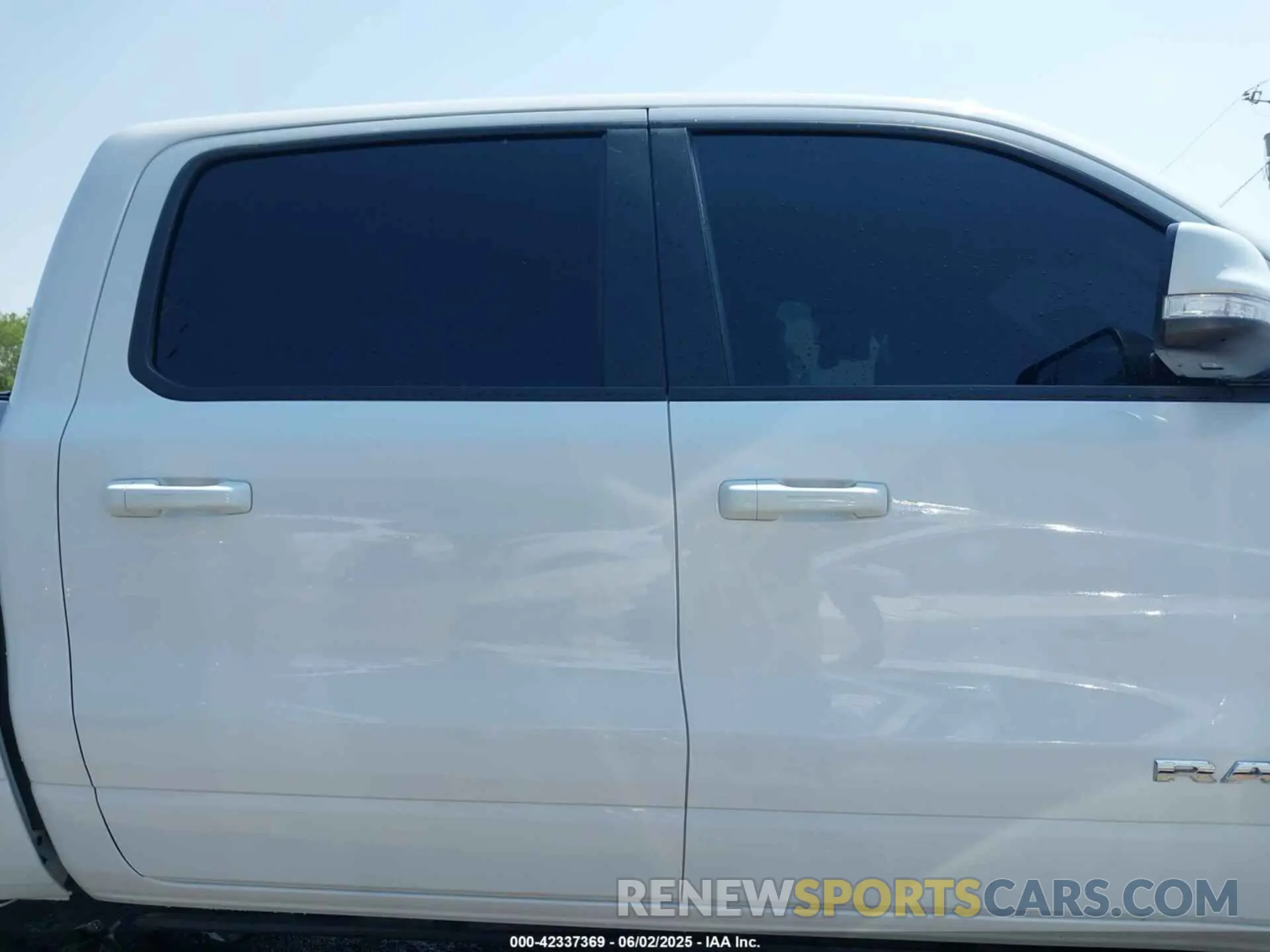 12 Photograph of a damaged car 1C6SRFFT6MN785594 RAM 1500 2021