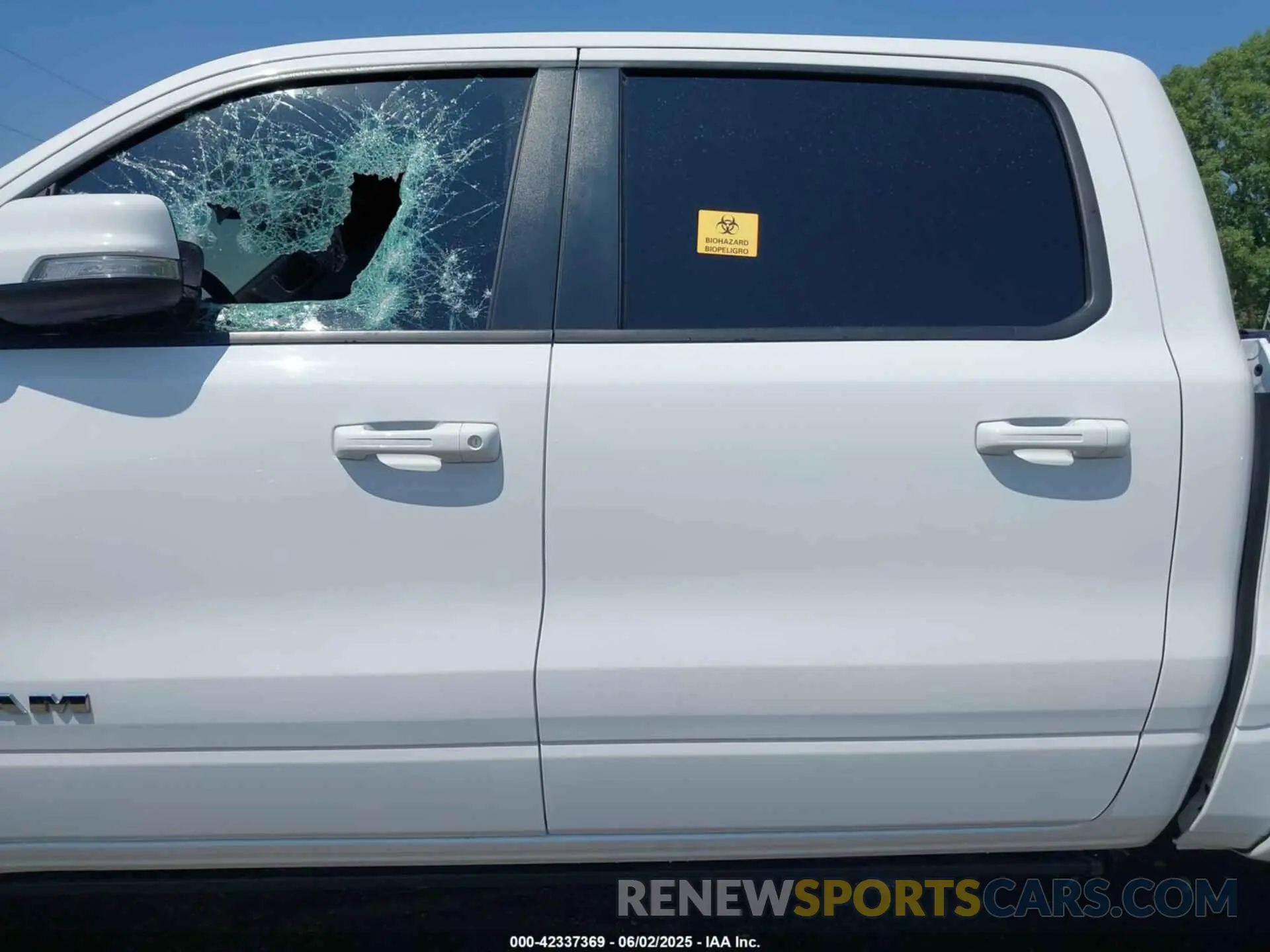13 Photograph of a damaged car 1C6SRFFT6MN785594 RAM 1500 2021