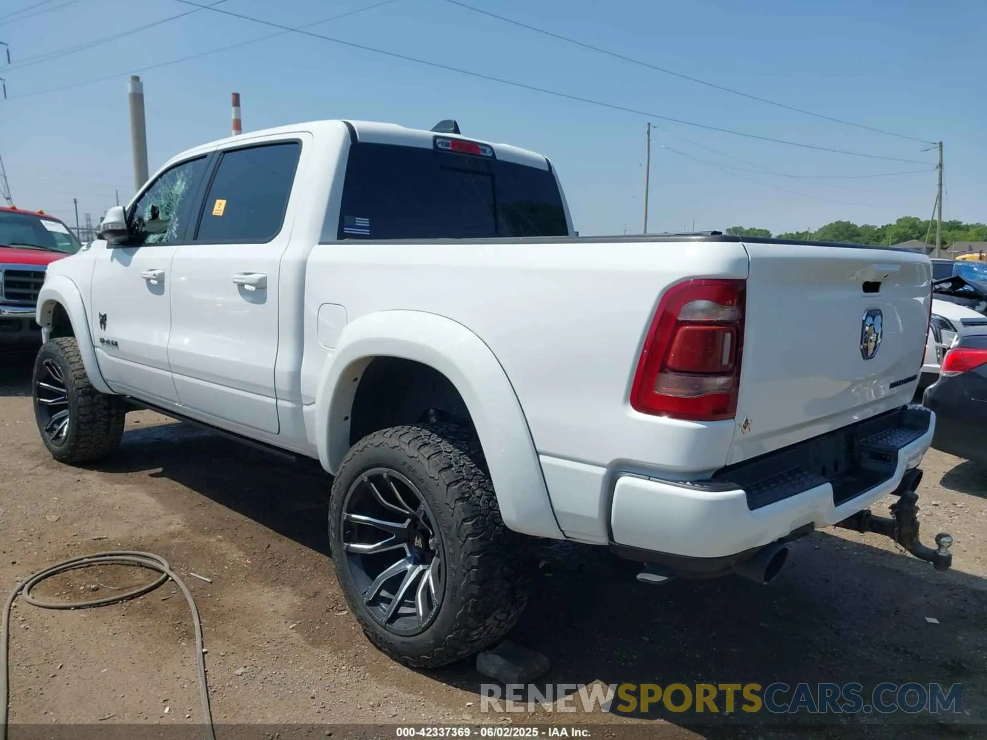 3 Photograph of a damaged car 1C6SRFFT6MN785594 RAM 1500 2021