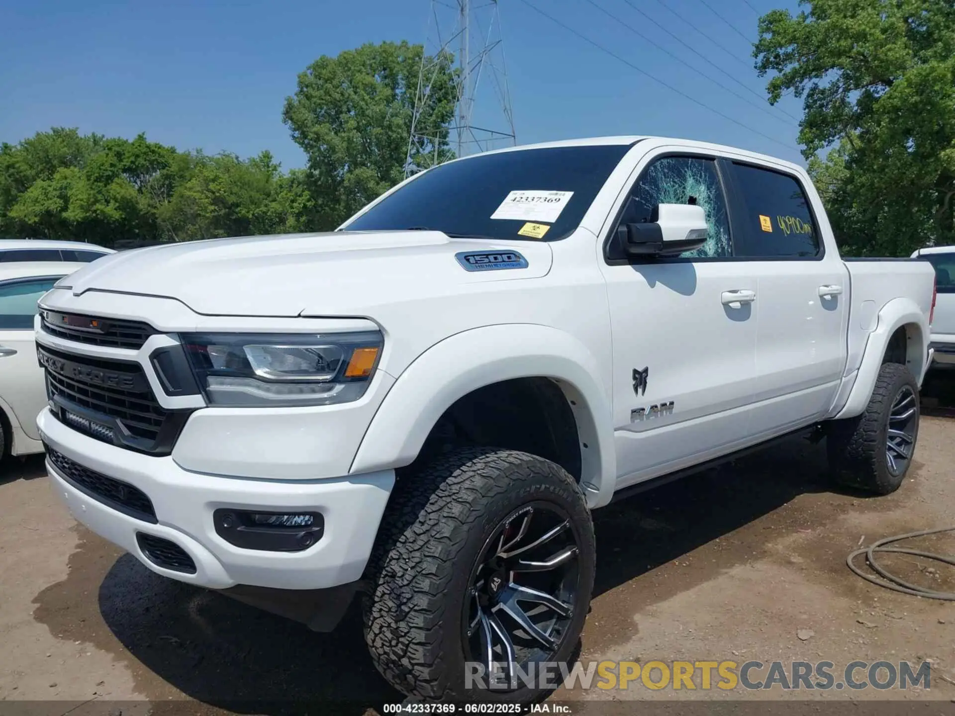 6 Photograph of a damaged car 1C6SRFFT6MN785594 RAM 1500 2021