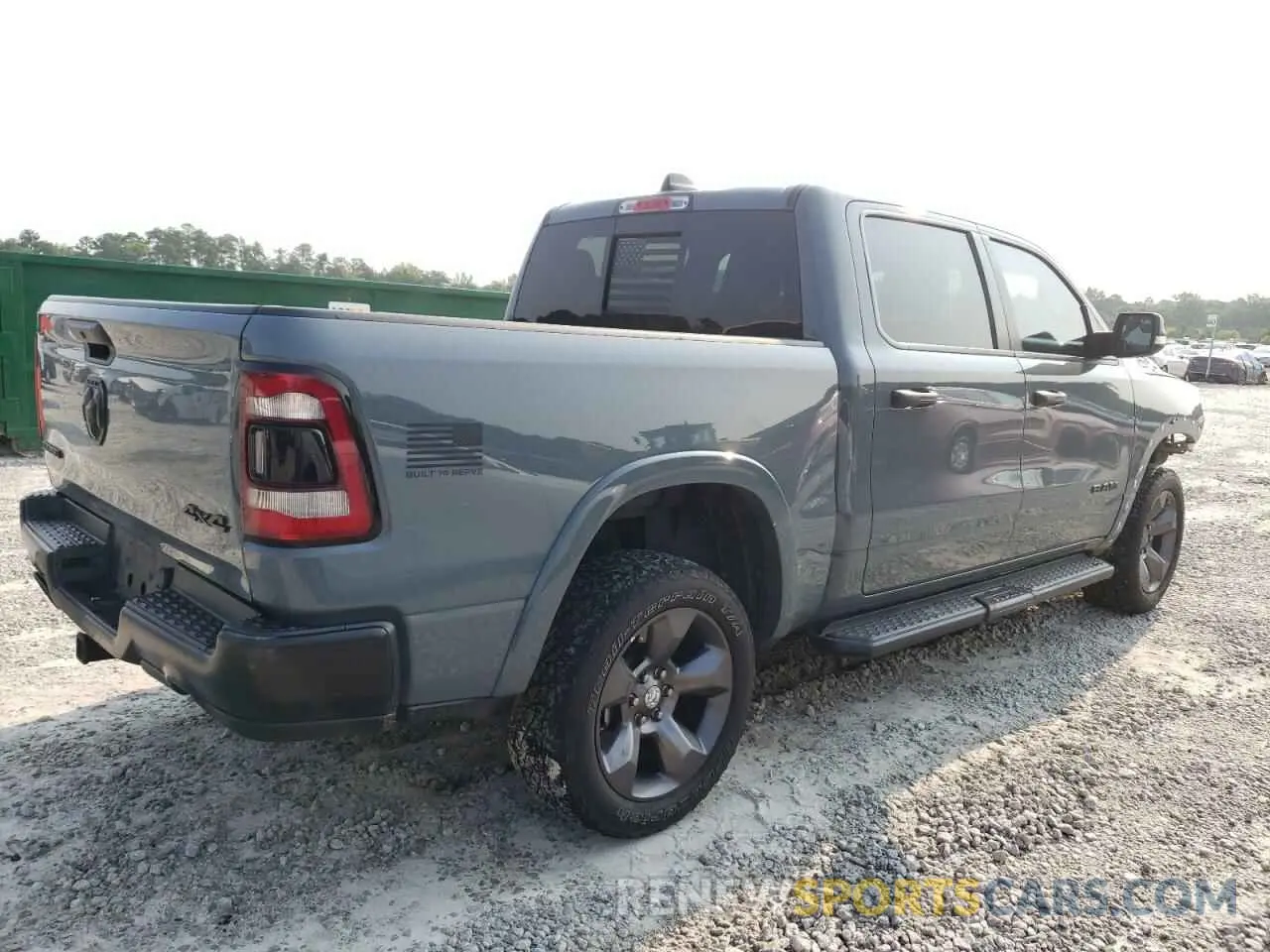 3 Photograph of a damaged car 1C6SRFFT7MN562092 RAM 1500 2021