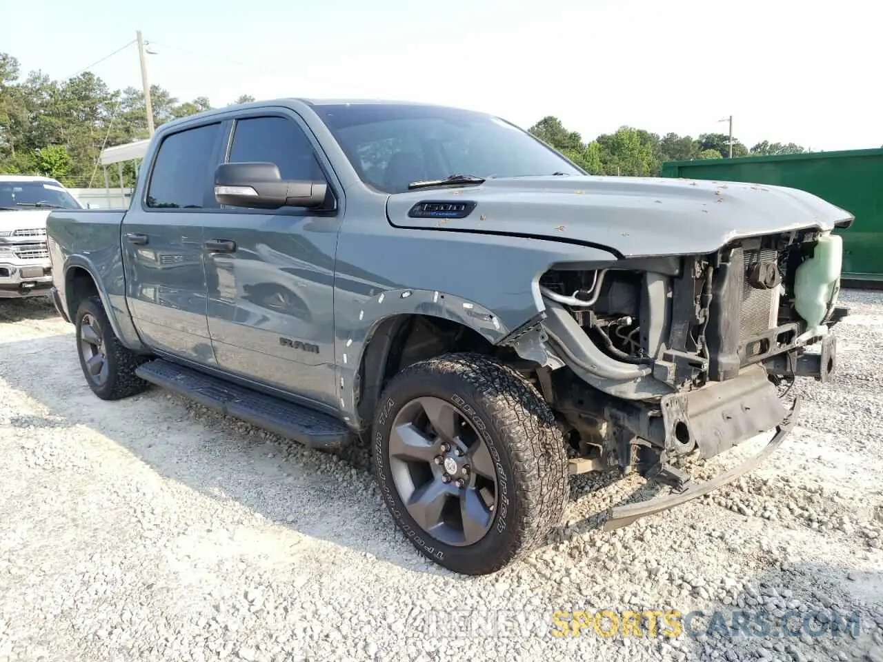 4 Photograph of a damaged car 1C6SRFFT7MN562092 RAM 1500 2021