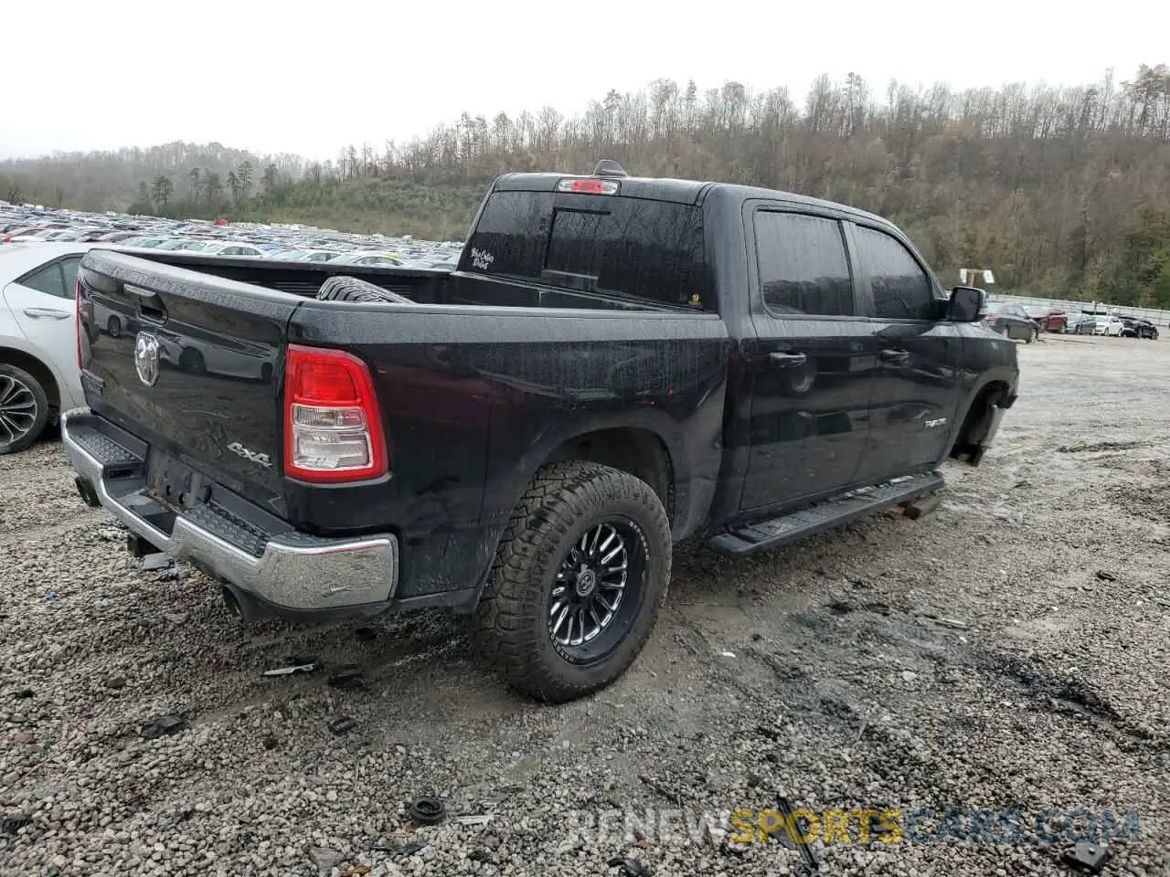 3 Photograph of a damaged car 1C6SRFFT7MN569298 RAM 1500 2021