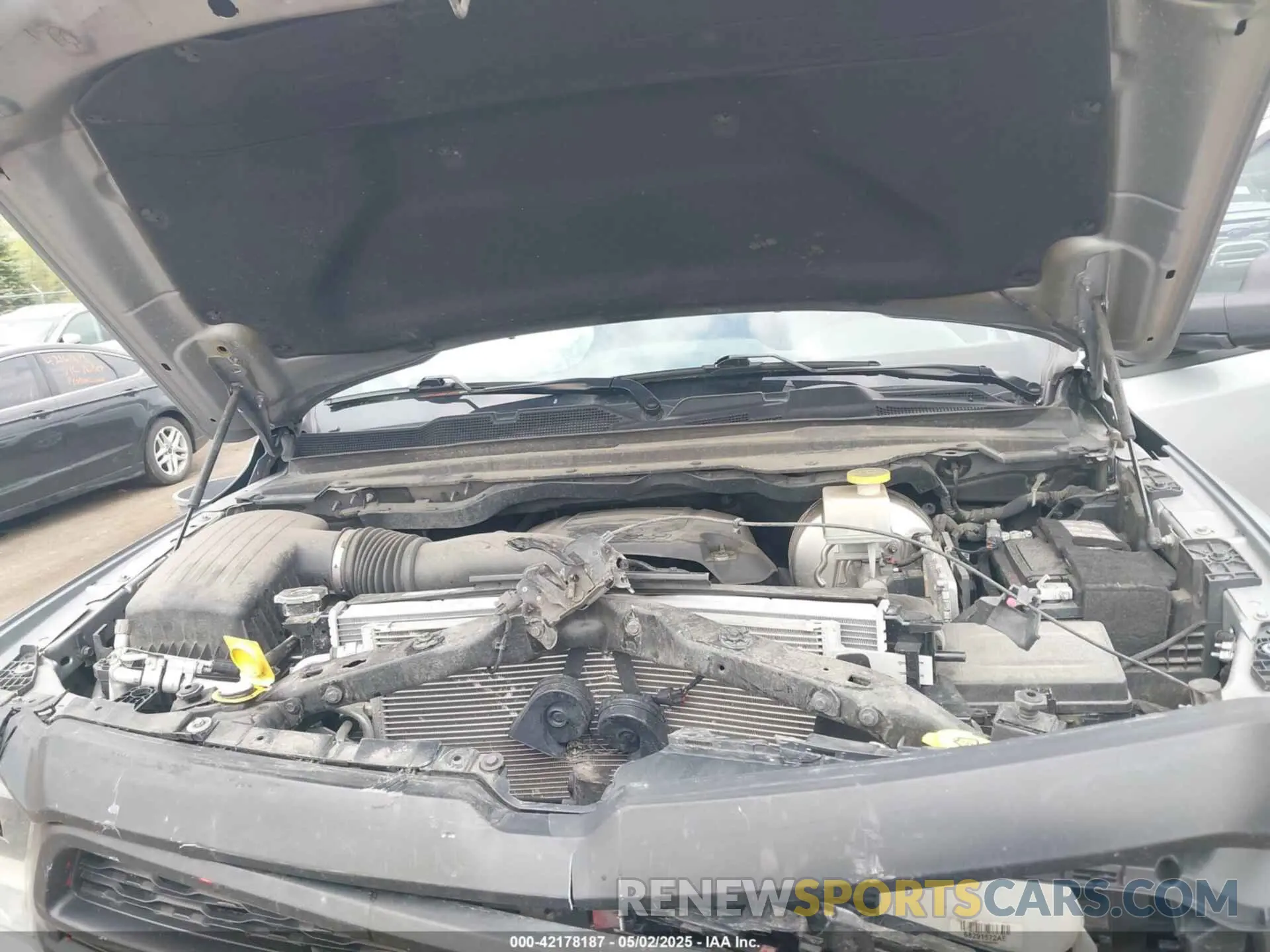 10 Photograph of a damaged car 1C6SRFFT7MN597036 RAM 1500 2021