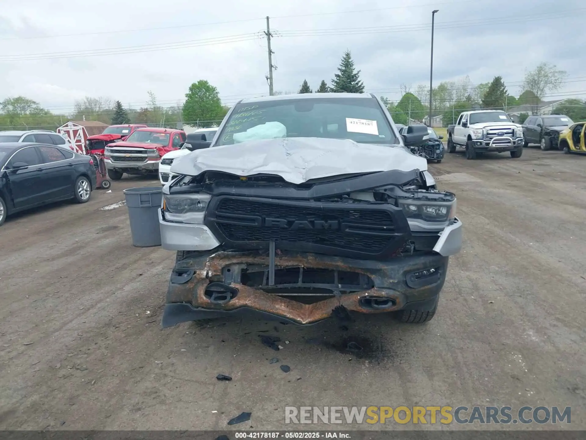 12 Photograph of a damaged car 1C6SRFFT7MN597036 RAM 1500 2021