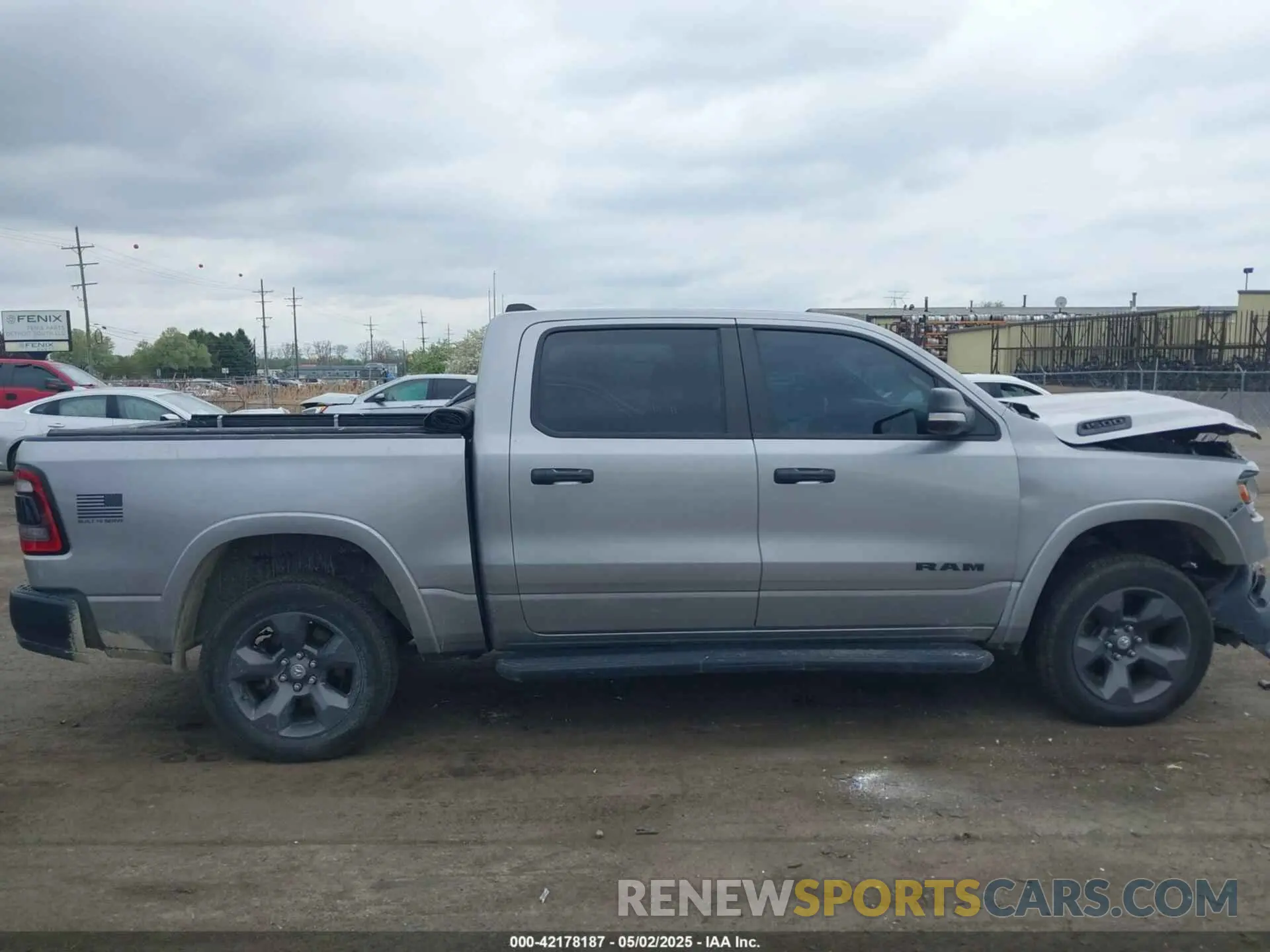 13 Photograph of a damaged car 1C6SRFFT7MN597036 RAM 1500 2021