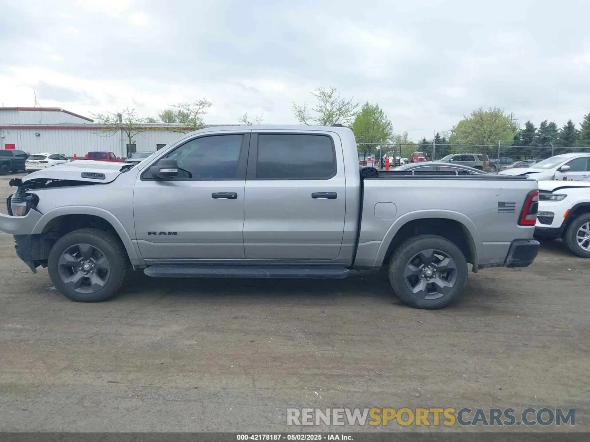 14 Photograph of a damaged car 1C6SRFFT7MN597036 RAM 1500 2021