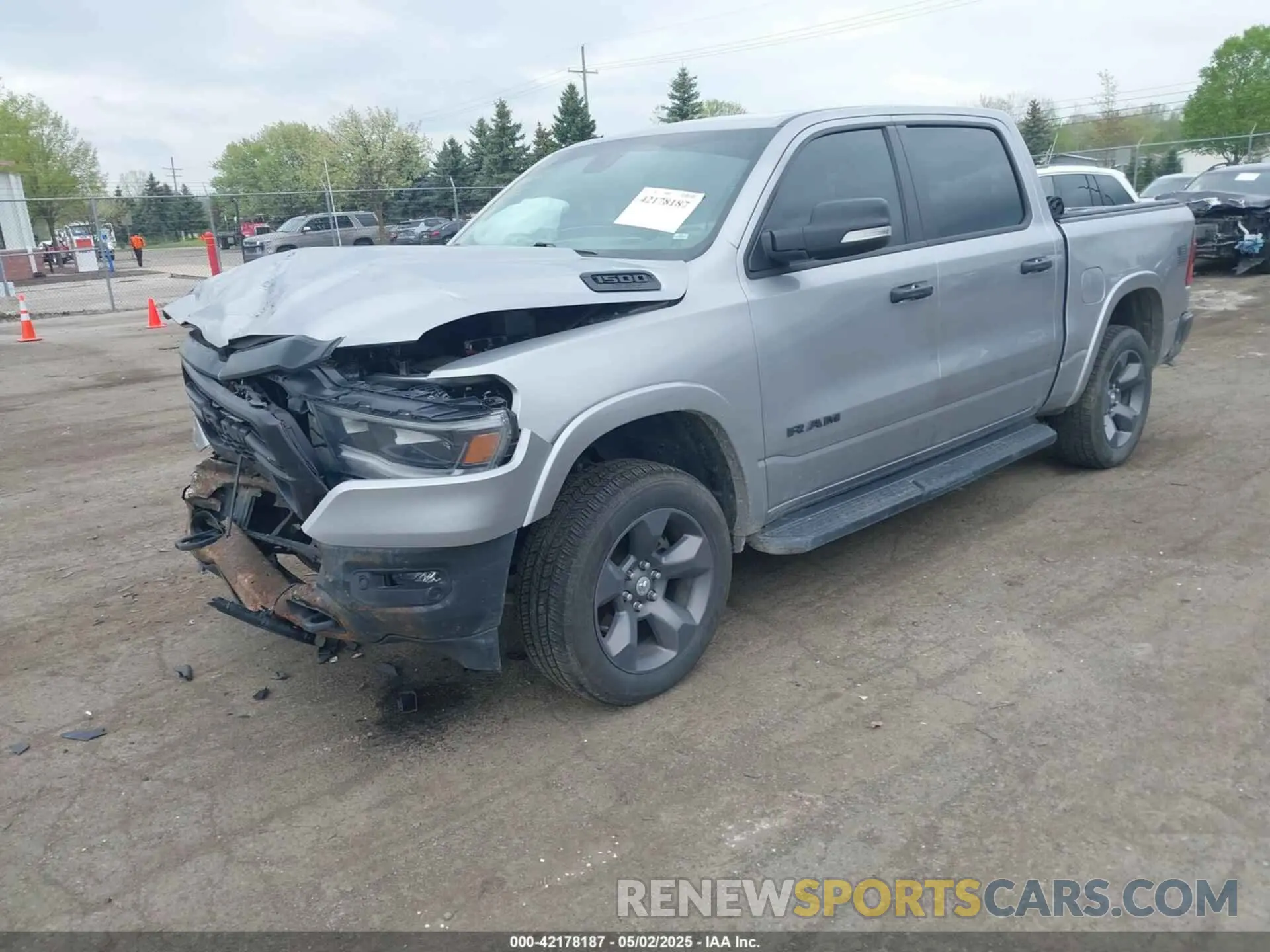 2 Photograph of a damaged car 1C6SRFFT7MN597036 RAM 1500 2021