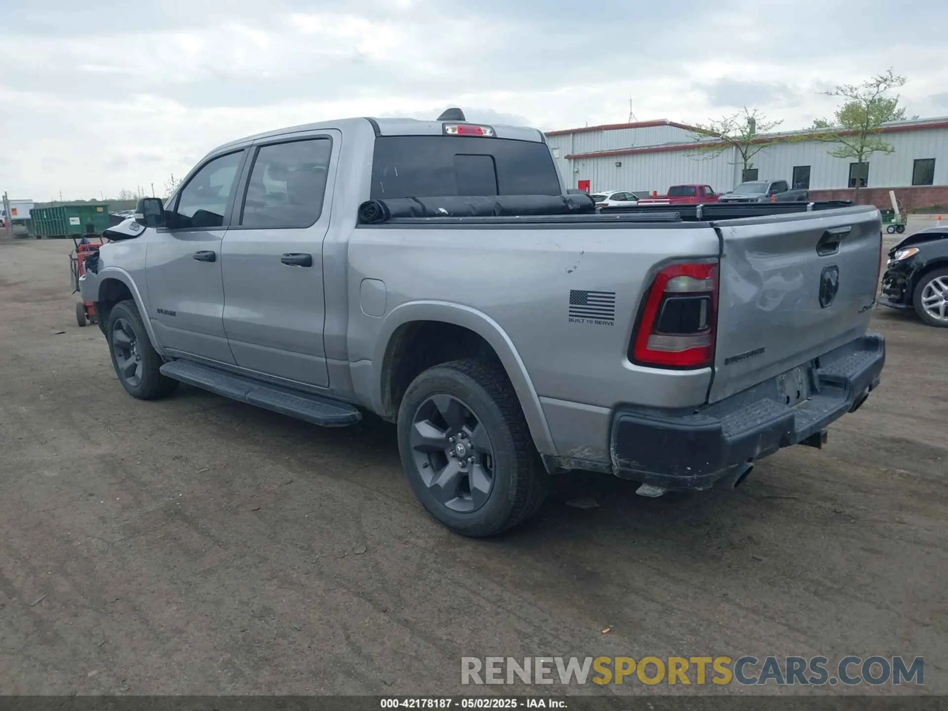 3 Photograph of a damaged car 1C6SRFFT7MN597036 RAM 1500 2021