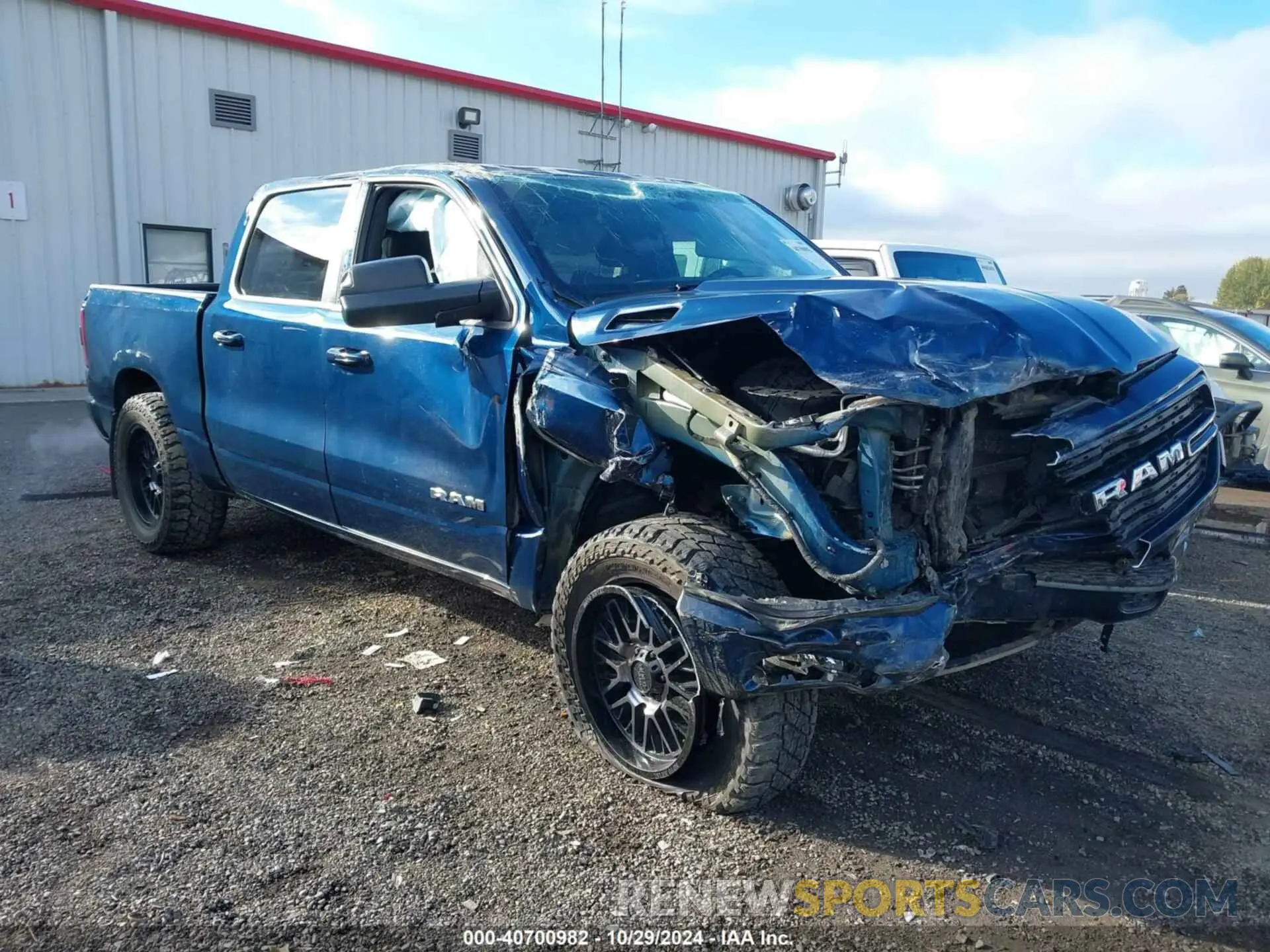 1 Photograph of a damaged car 1C6SRFFT7MN717949 RAM 1500 2021