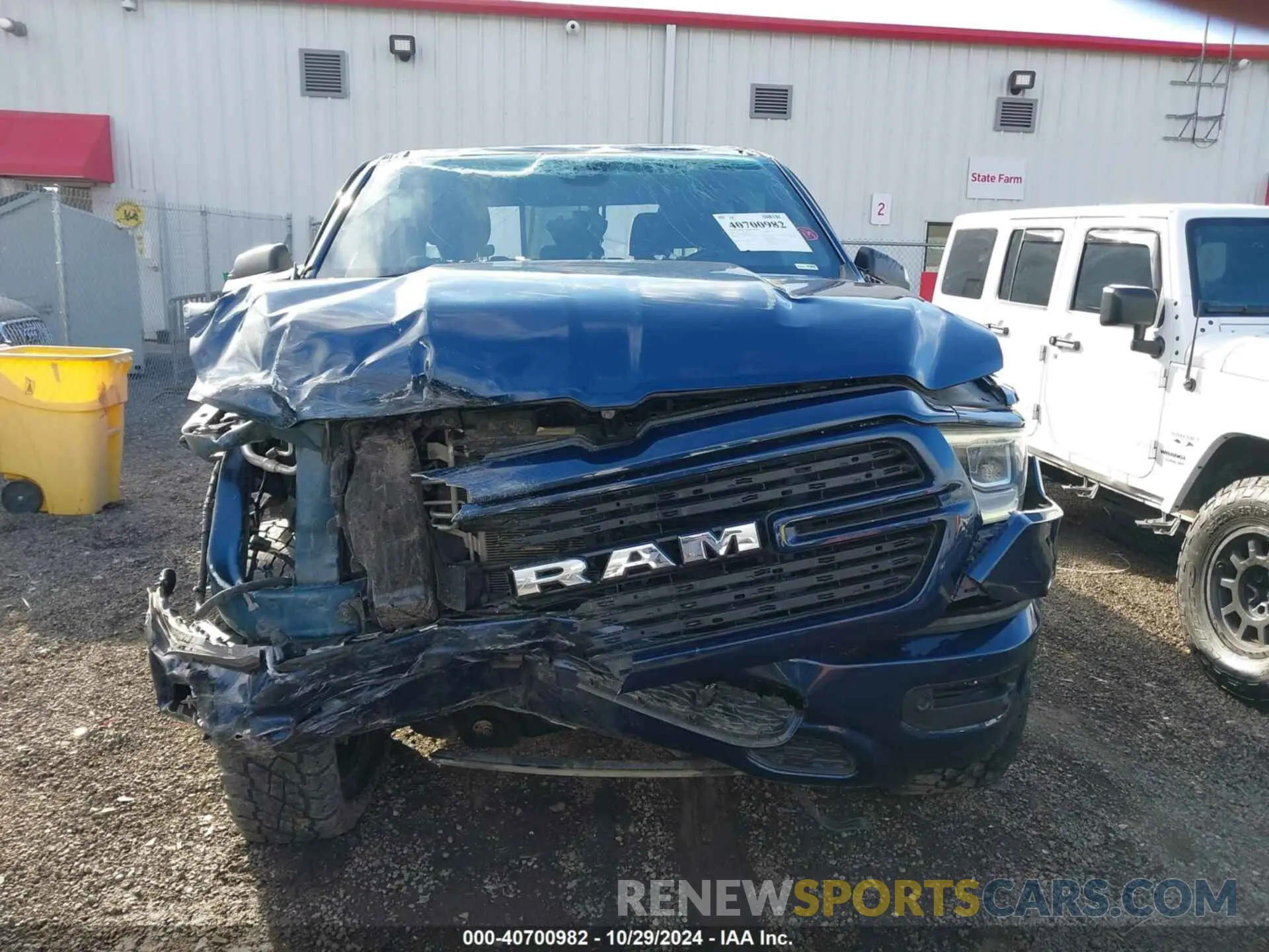 13 Photograph of a damaged car 1C6SRFFT7MN717949 RAM 1500 2021