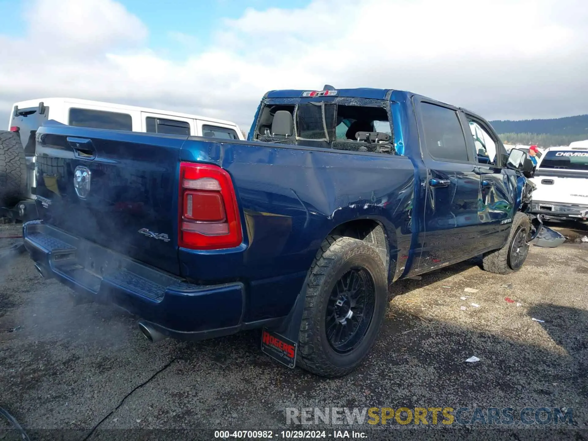 4 Photograph of a damaged car 1C6SRFFT7MN717949 RAM 1500 2021