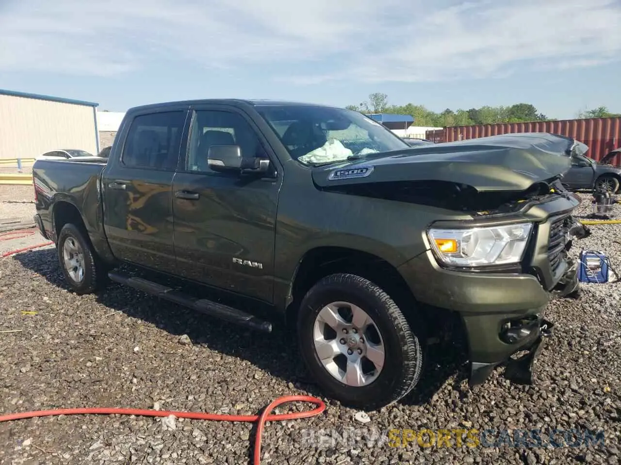 4 Photograph of a damaged car 1C6SRFFT8MN504931 RAM 1500 2021