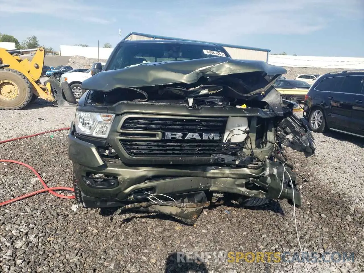 5 Photograph of a damaged car 1C6SRFFT8MN504931 RAM 1500 2021