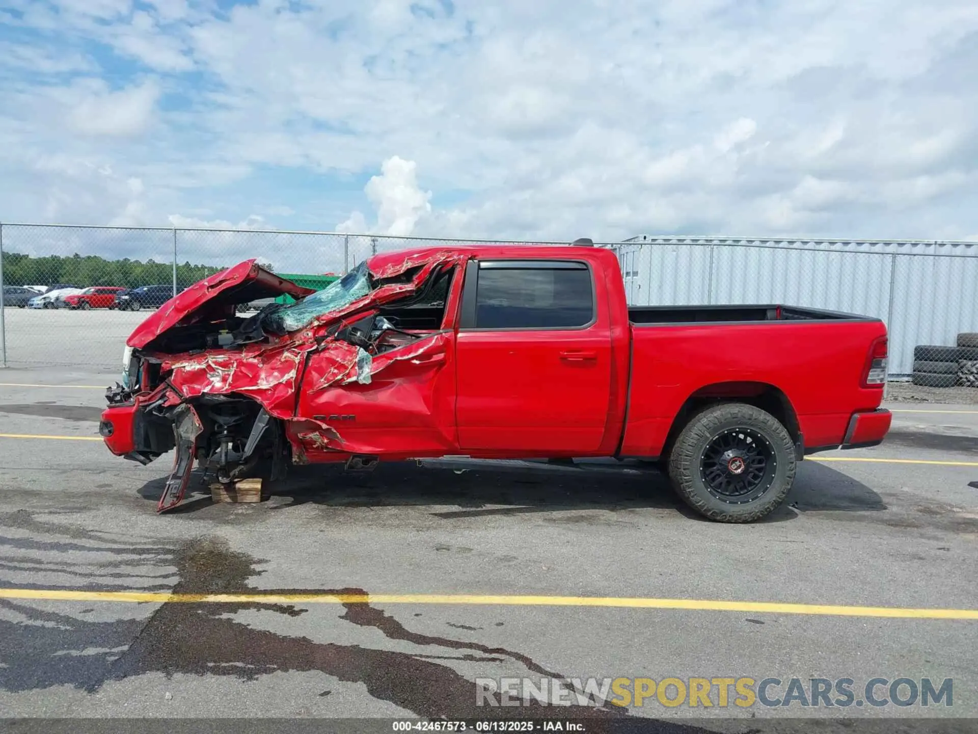 14 Photograph of a damaged car 1C6SRFFT8MN622915 RAM 1500 2021