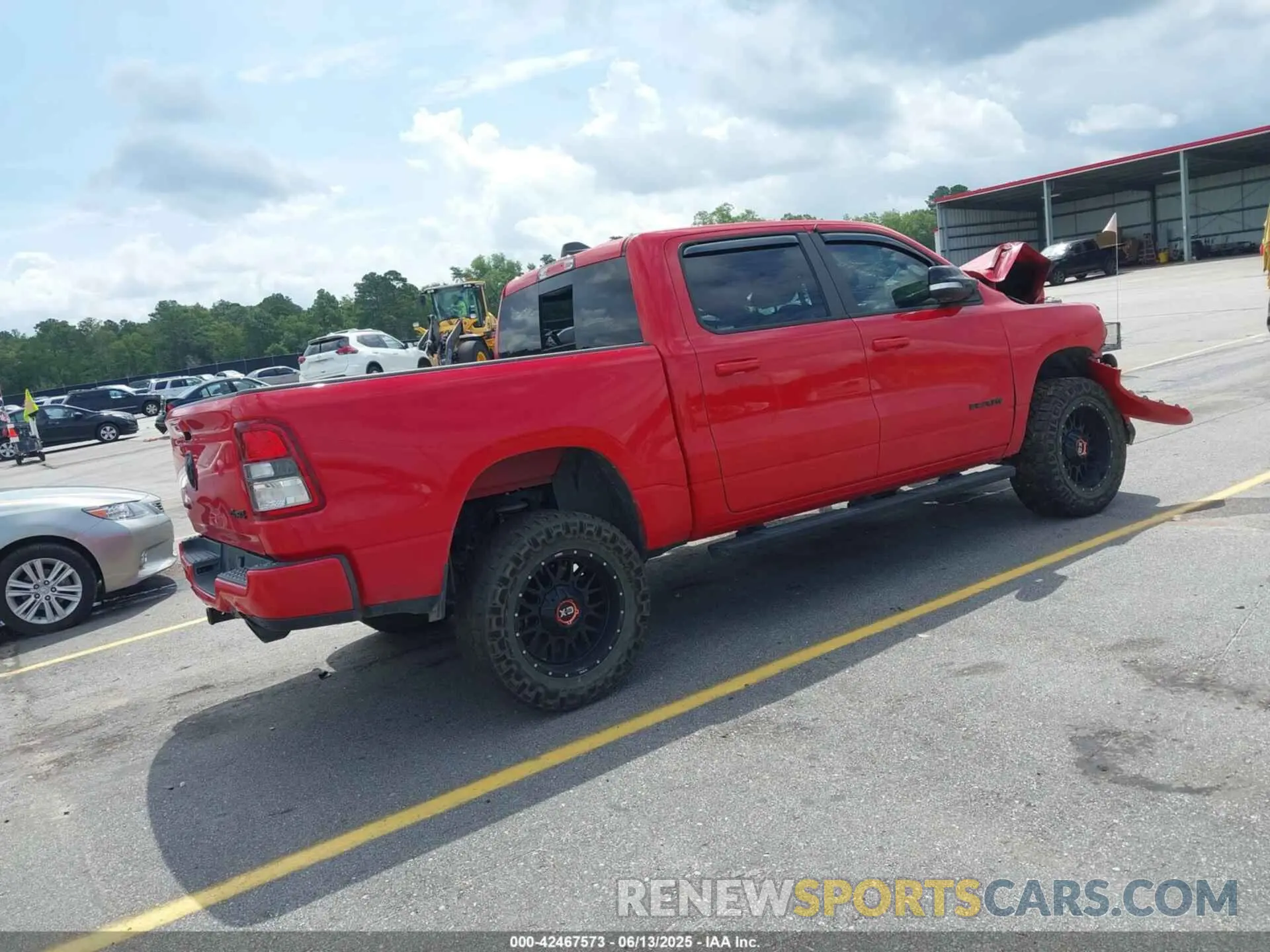 4 Photograph of a damaged car 1C6SRFFT8MN622915 RAM 1500 2021