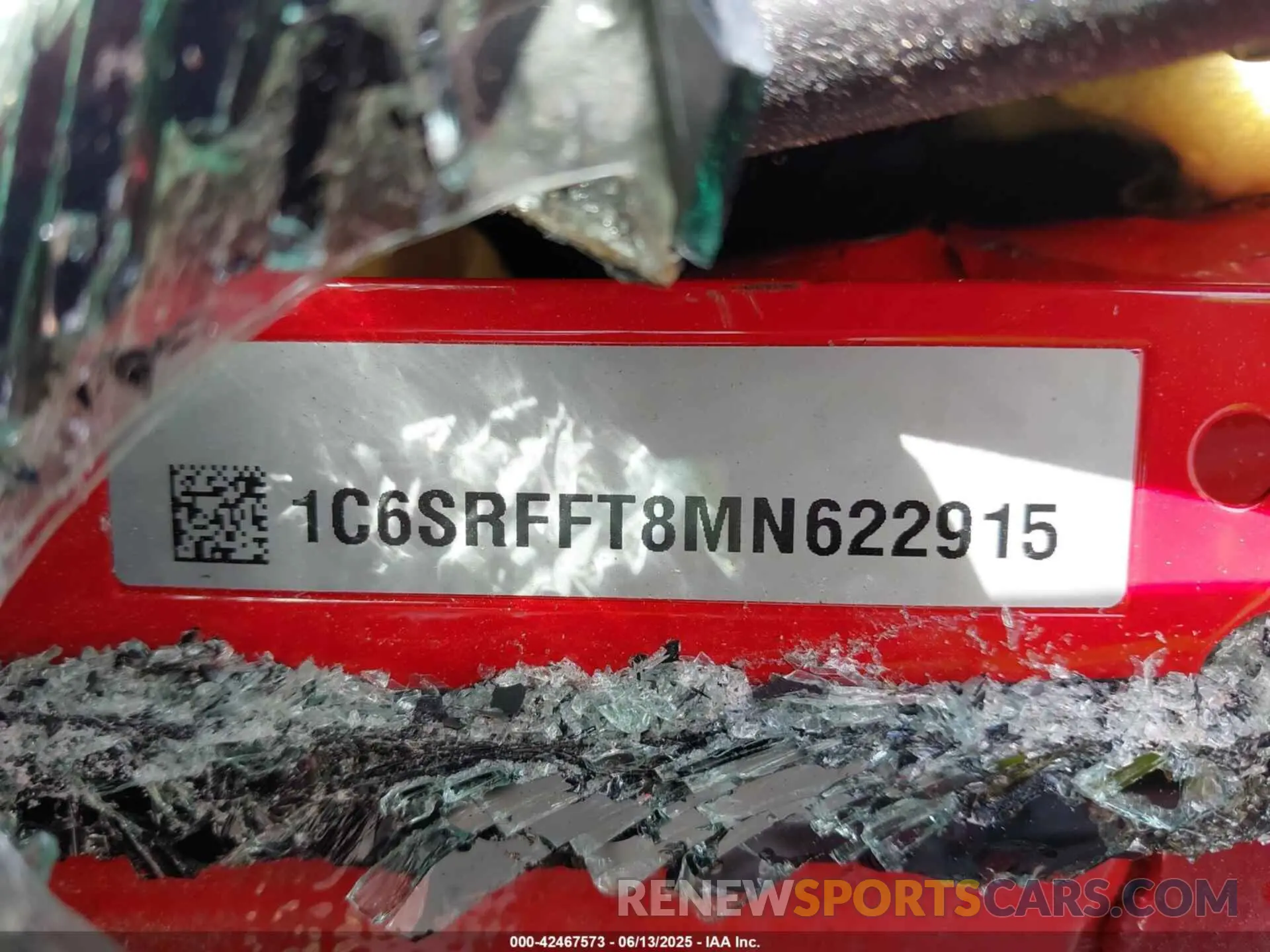 9 Photograph of a damaged car 1C6SRFFT8MN622915 RAM 1500 2021