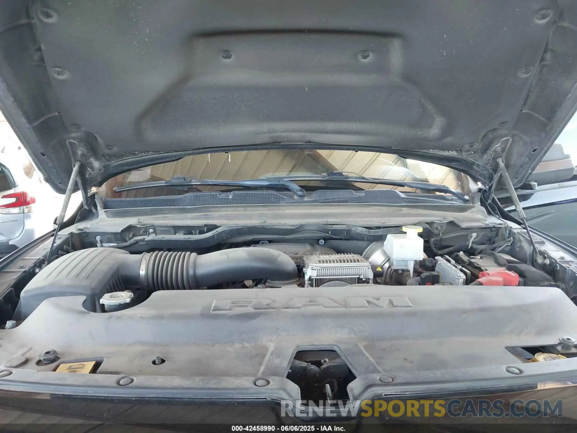 10 Photograph of a damaged car 1C6SRFFT8MN658975 RAM 1500 2021