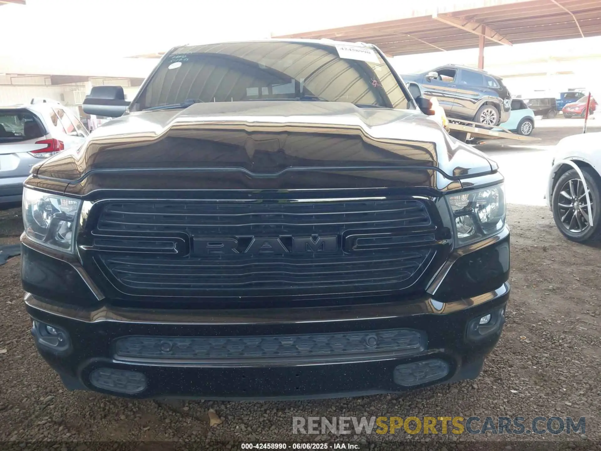12 Photograph of a damaged car 1C6SRFFT8MN658975 RAM 1500 2021
