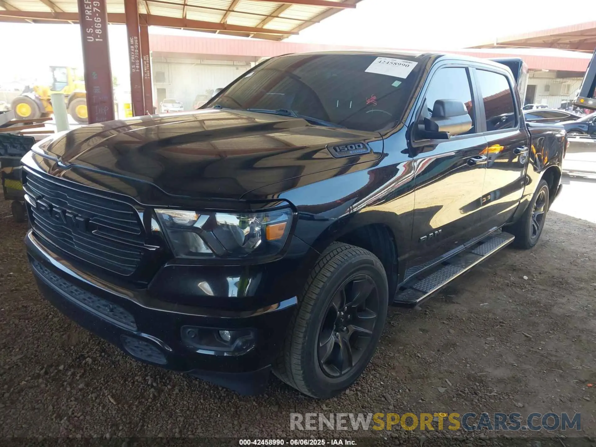 2 Photograph of a damaged car 1C6SRFFT8MN658975 RAM 1500 2021