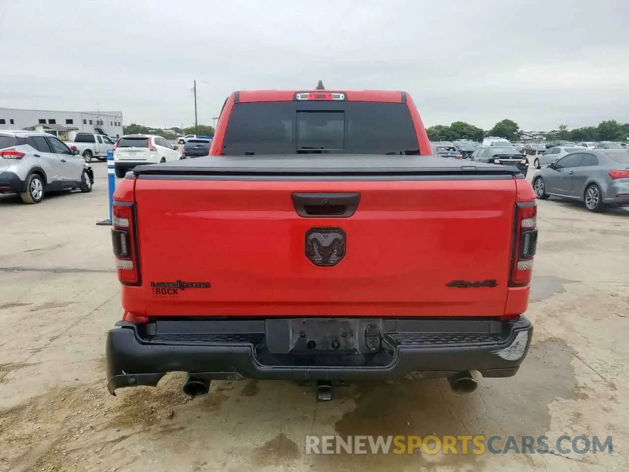 6 Photograph of a damaged car 1C6SRFFT8MN704711 RAM 1500 2021