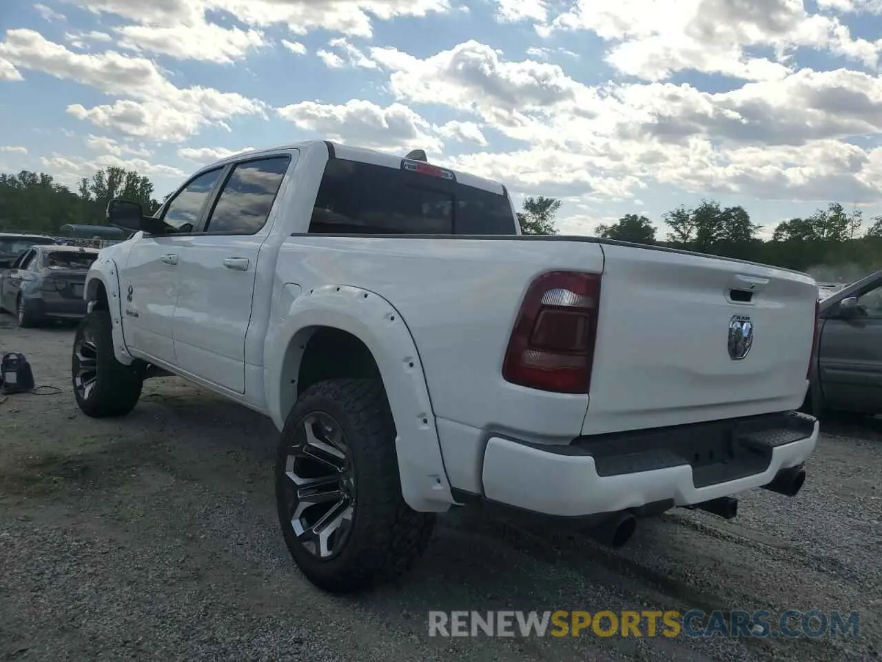 2 Photograph of a damaged car 1C6SRFFT8MN761491 RAM 1500 2021
