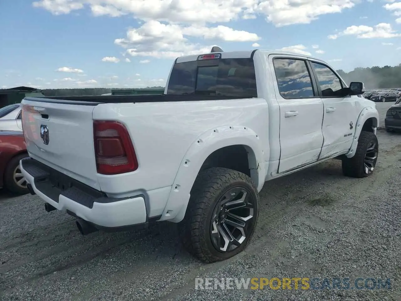 3 Photograph of a damaged car 1C6SRFFT8MN761491 RAM 1500 2021