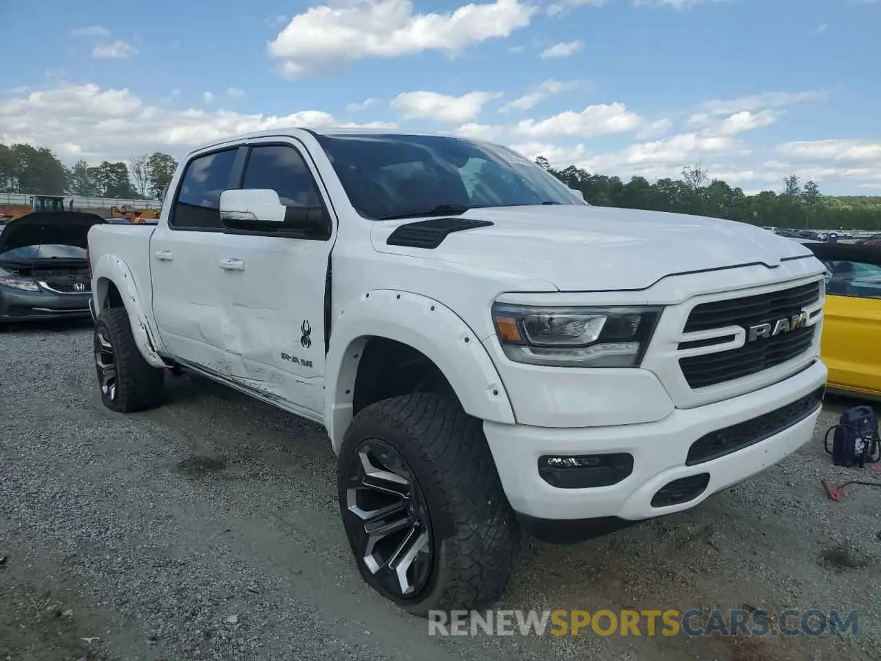 4 Photograph of a damaged car 1C6SRFFT8MN761491 RAM 1500 2021