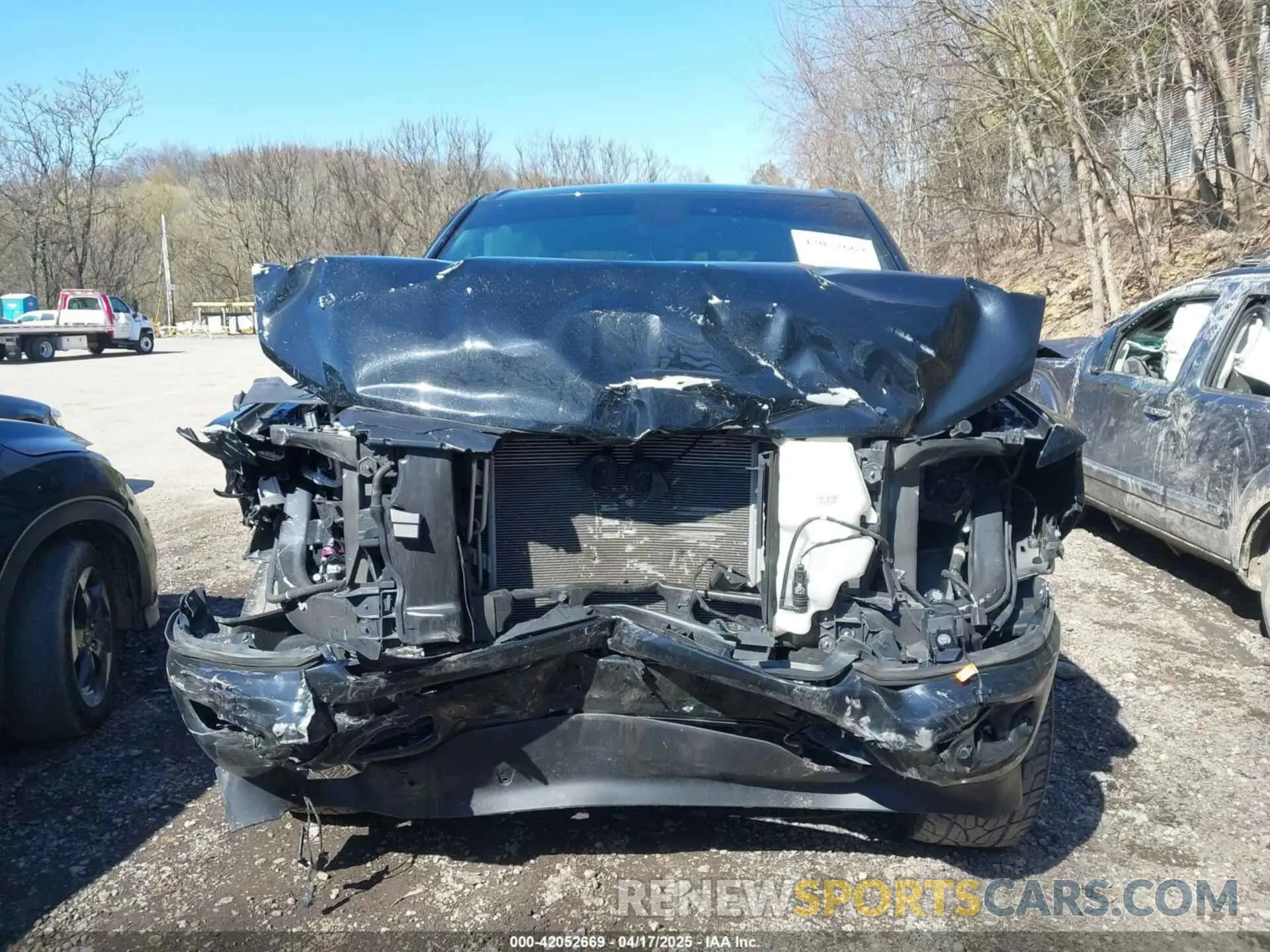 6 Photograph of a damaged car 1C6SRFFT9MN611812 RAM 1500 2021
