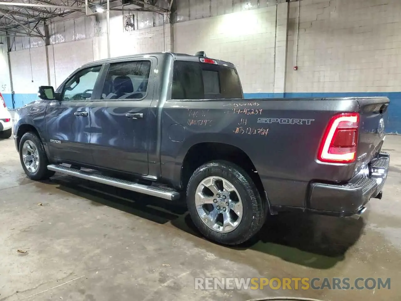 2 Photograph of a damaged car 1C6SRFFT9MN647970 RAM 1500 2021