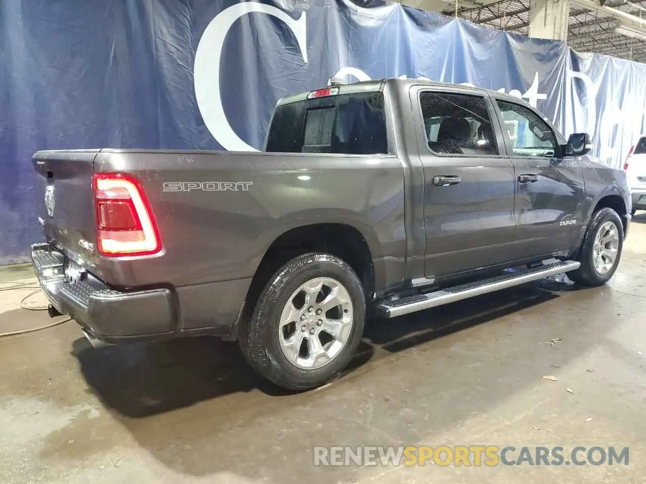 3 Photograph of a damaged car 1C6SRFFT9MN647970 RAM 1500 2021