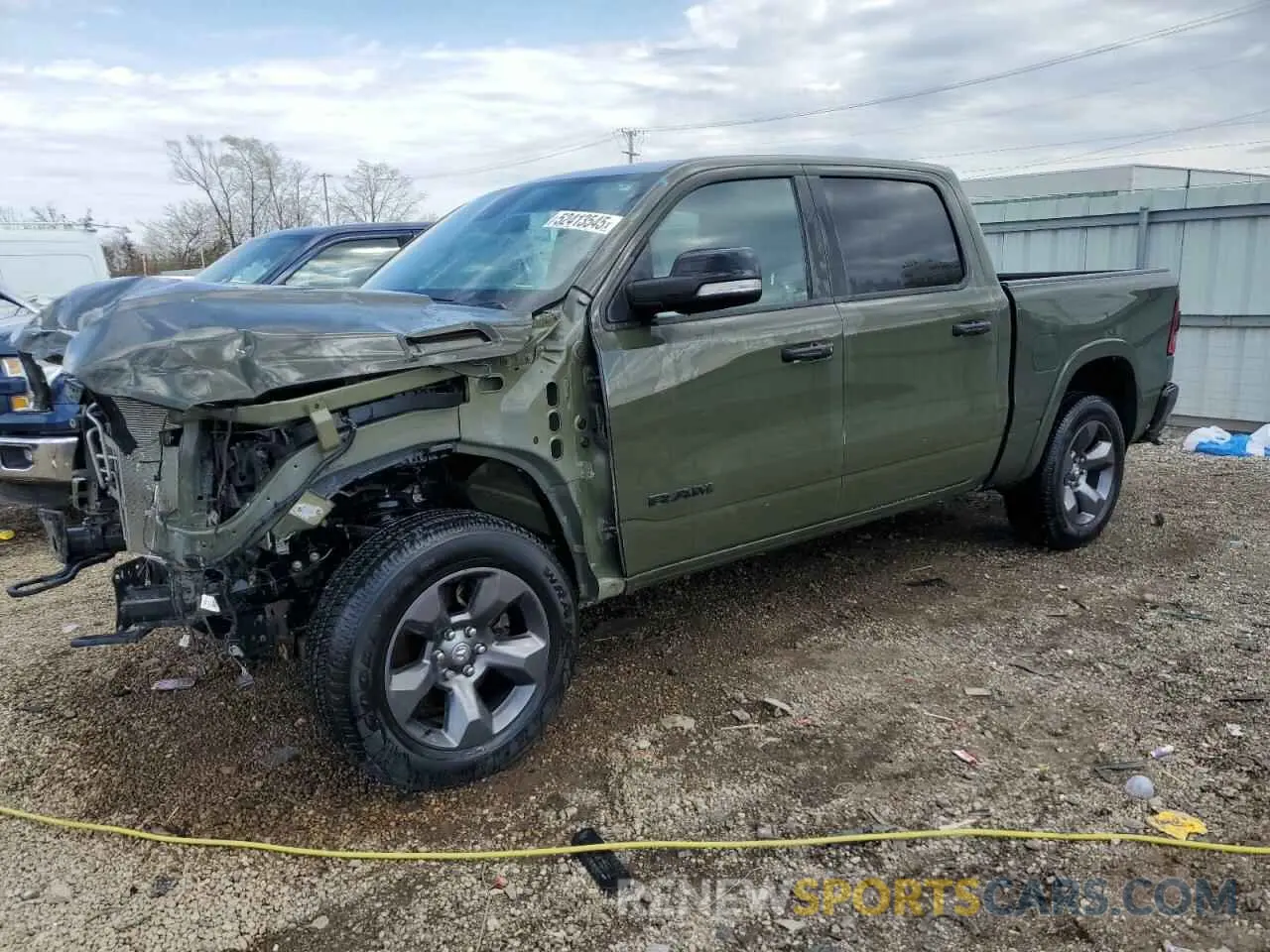 1 Photograph of a damaged car 1C6SRFFT9MN662288 RAM 1500 2021
