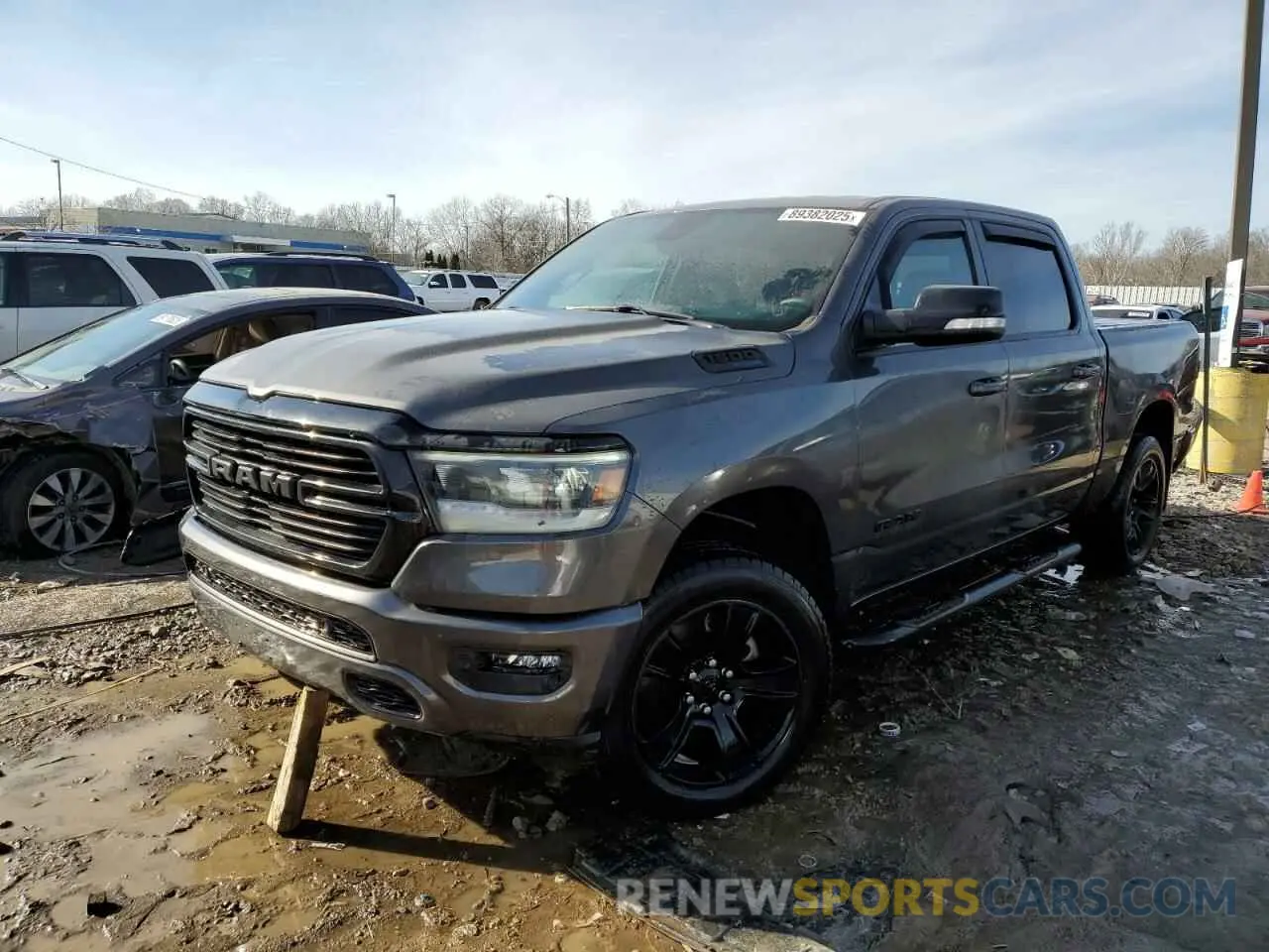 1 Photograph of a damaged car 1C6SRFFT9MN674134 RAM 1500 2021
