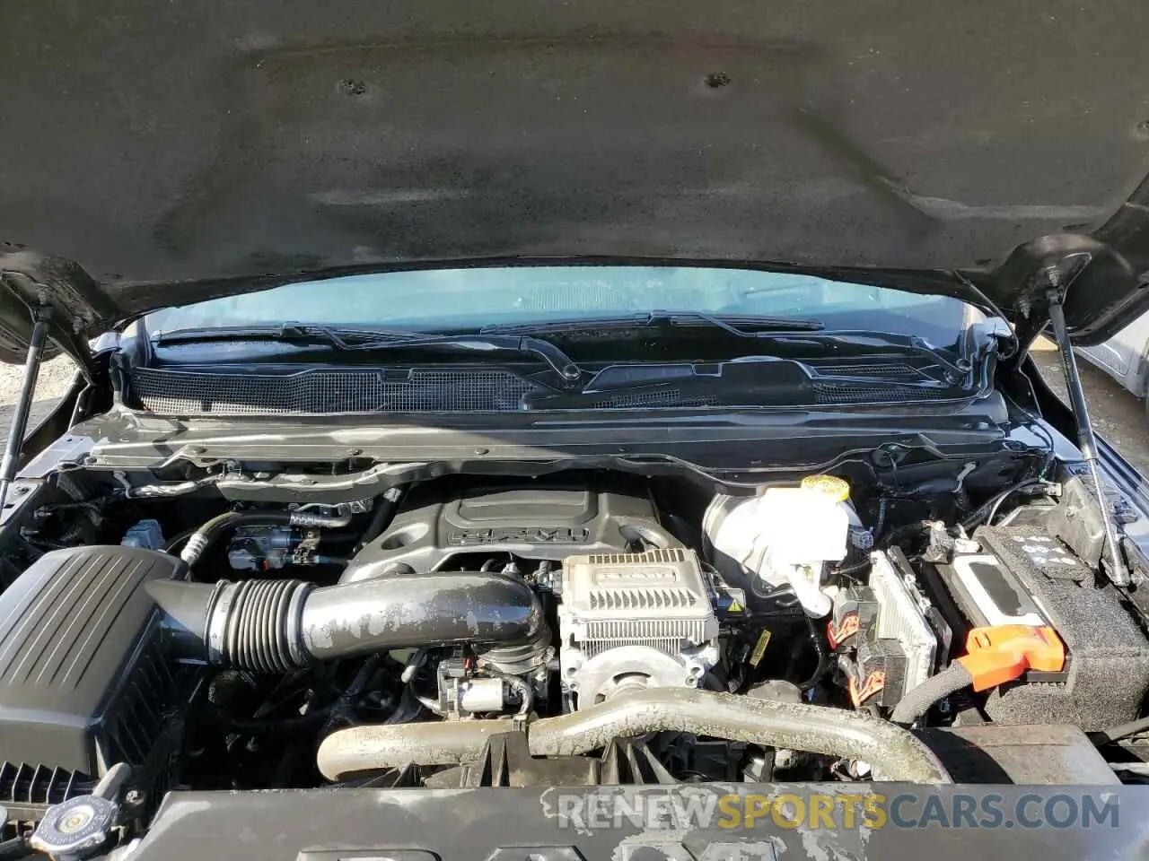11 Photograph of a damaged car 1C6SRFFT9MN674134 RAM 1500 2021