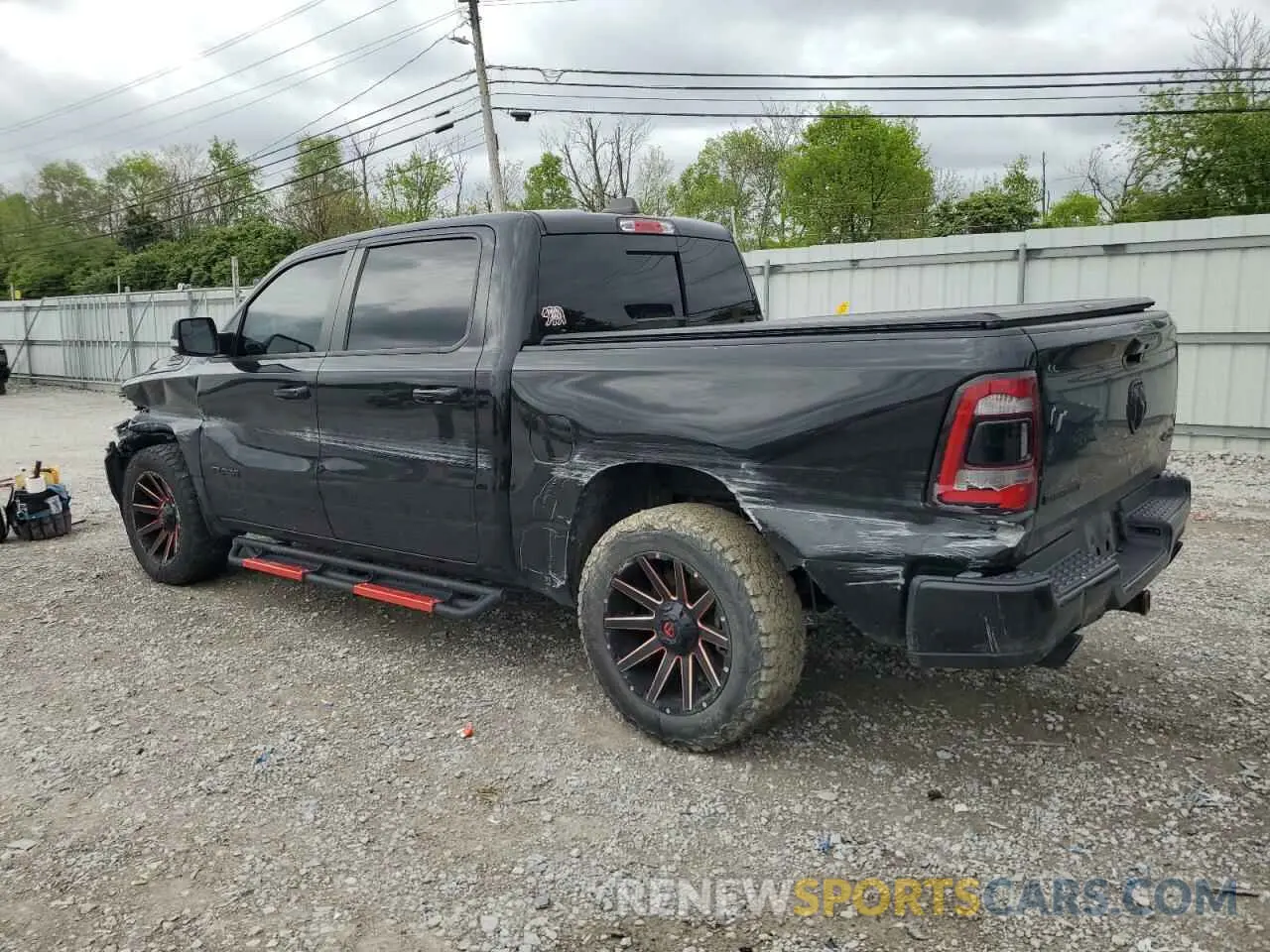 2 Photograph of a damaged car 1C6SRFFTXMN512576 RAM 1500 2021