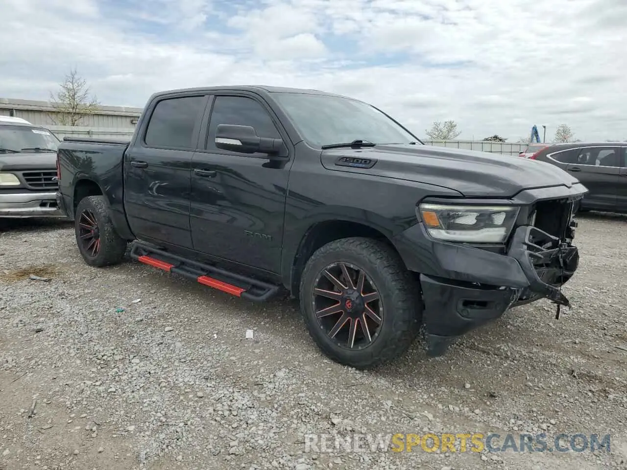 4 Photograph of a damaged car 1C6SRFFTXMN512576 RAM 1500 2021