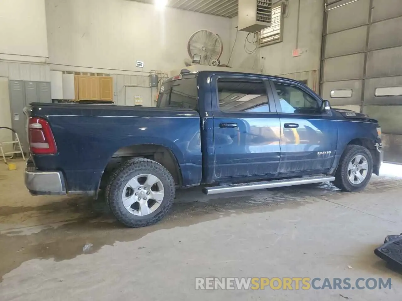 3 Photograph of a damaged car 1C6SRFFTXMN515767 RAM 1500 2021